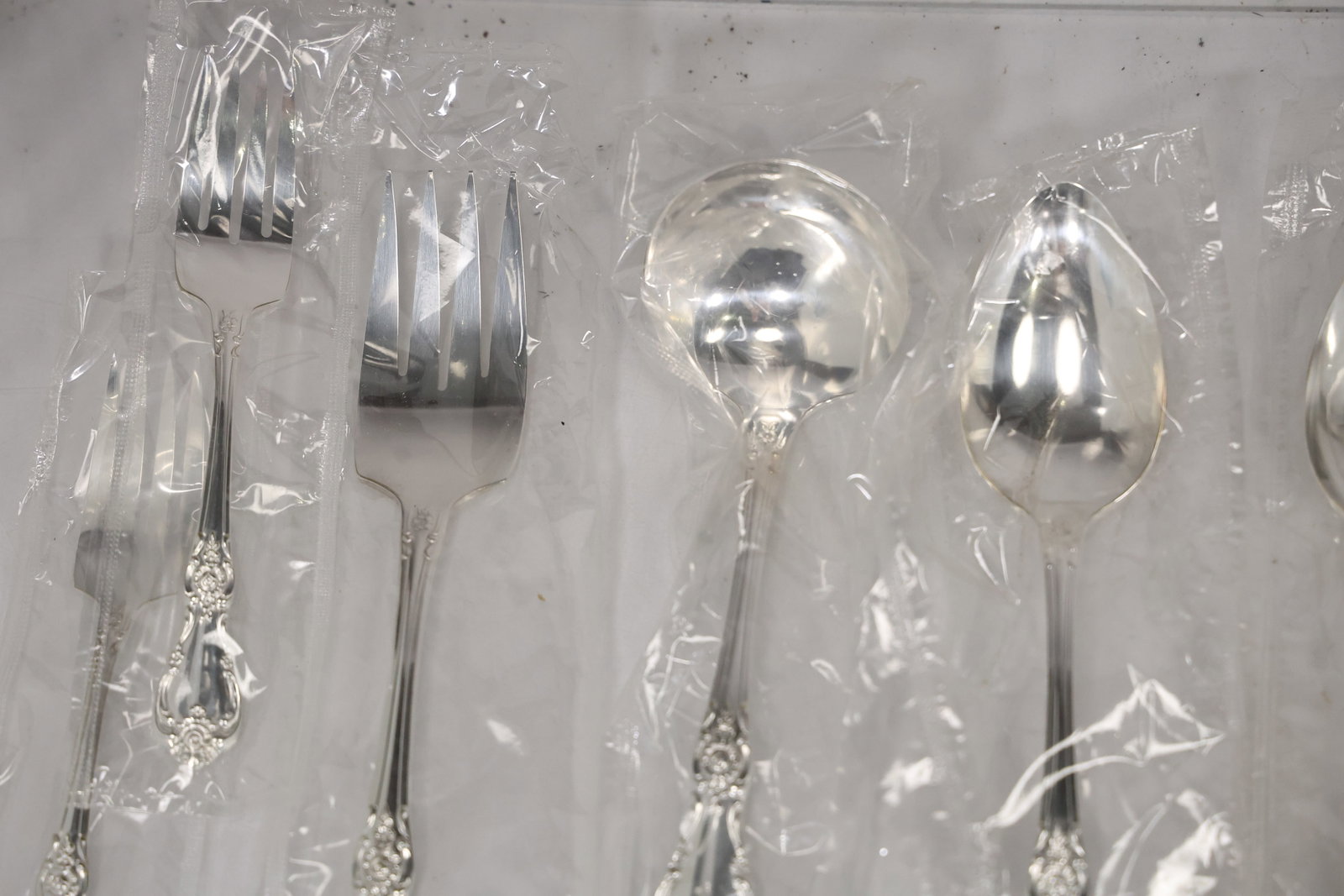 Large Unmarked Floral Pattern Silver Tone Flatware Set - 2