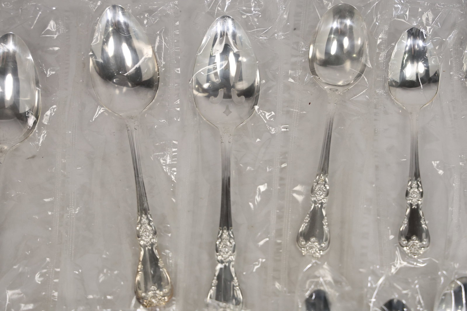 Large Unmarked Floral Pattern Silver Tone Flatware Set - 3