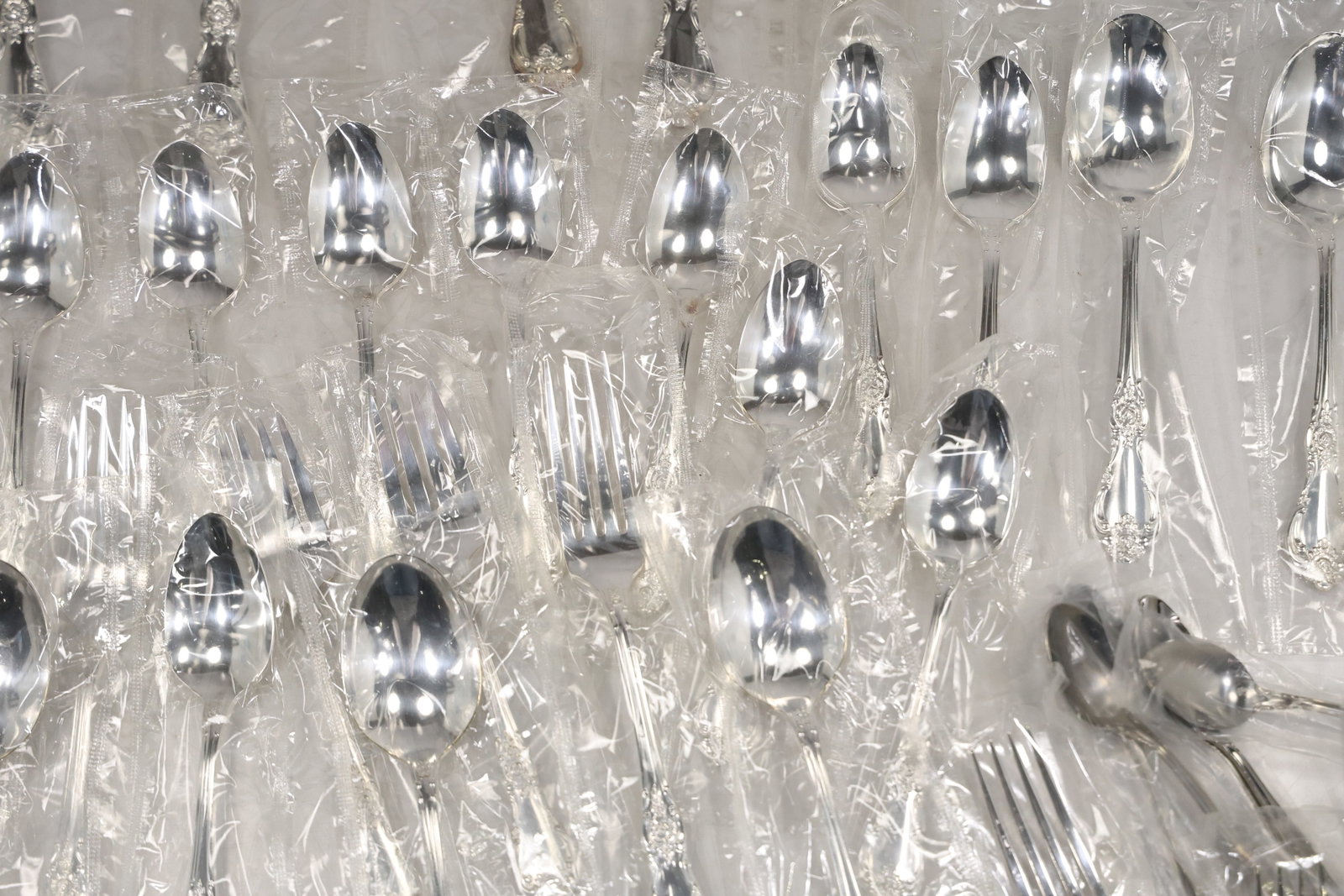 Large Unmarked Floral Pattern Silver Tone Flatware Set - 6