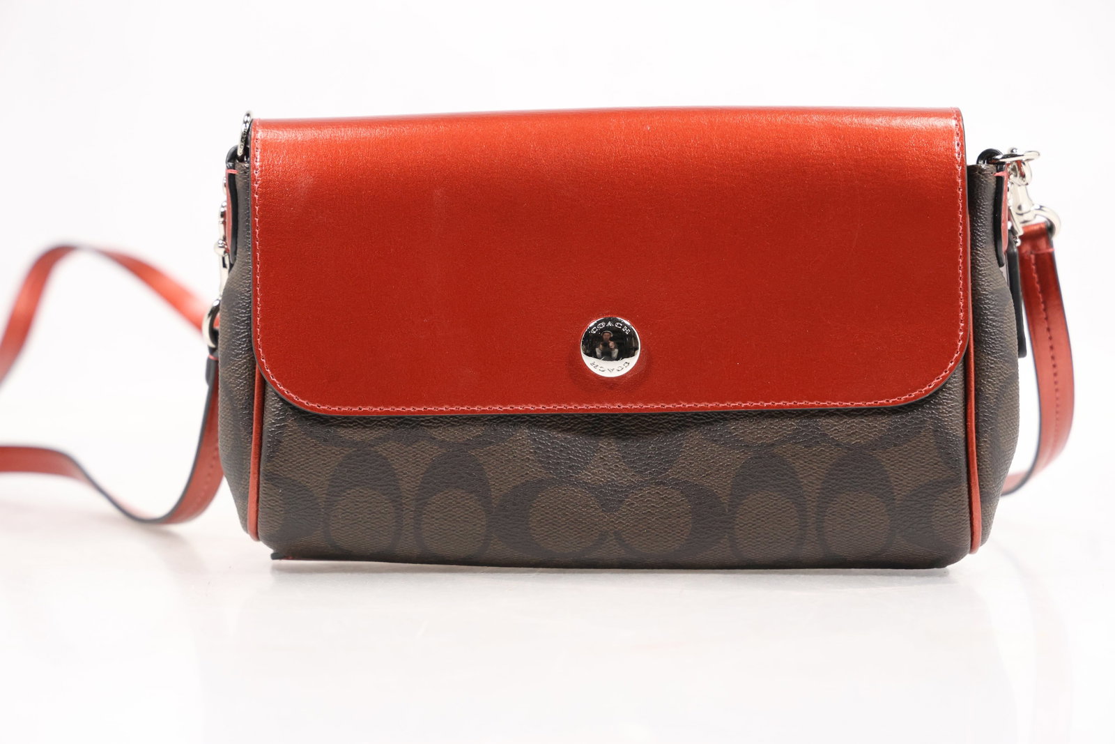 Coach reversible crossbody bag in signature coated canvas with a red leather flap (1 of 10)