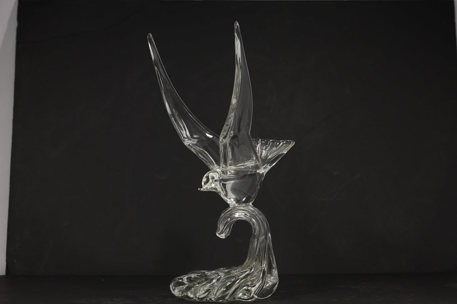 Signed Murano Italy Clear Art Glass Double Bird Sculpture: Clear Italian art glass sculpture depicting two stylized birds with an upper bird in flight above a lower curved bird form. The piece retains a Made in Murano Italy foil label and an etched signature