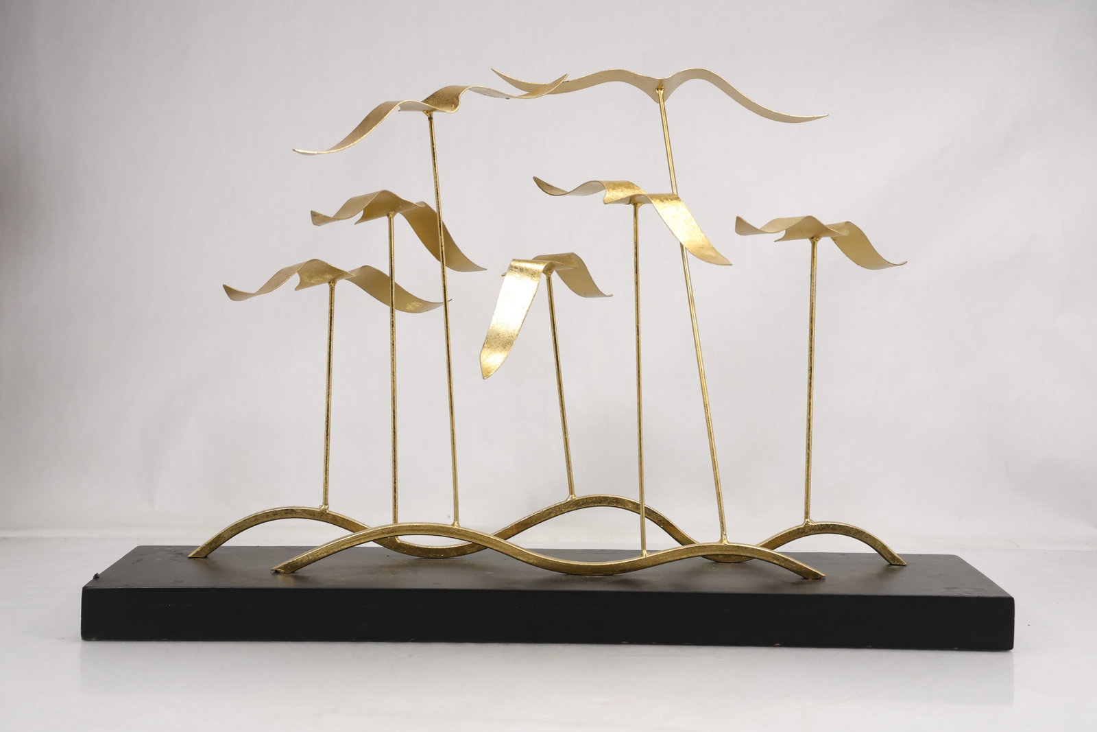 Curtis Jere Style Brass Seagull Sculpture on Base Mid Century Modern Coastal Decor: Curtis Jere Style Brass Seagull Sculpture on Base Mid Century Modern Coastal Decor size: 15h 23.75w S:E** Important Auction information:**** All lot descriptions in this auction were generated using a
