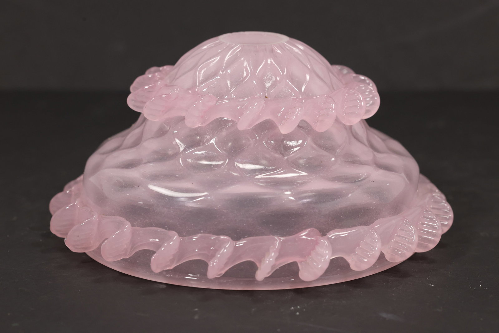 Pink Murano Glass Layered Rosette Chandelier Bobeche: Single vintage mid century Murano glass pink layered rosette chandelier bobeche from confirmed importer stock. The circular component has a central mounting aperture stacked petal bands and a radiatin