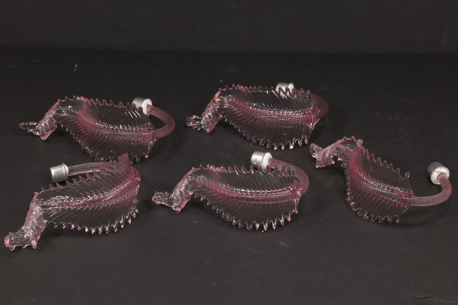 Set of Five Pink Murano Glass Leaf Chandelier Parts: Set of five vintage mid century Murano glass pink foliage chandelier replacement parts from confirmed importer stock. Each short curved element has a ribbed leaf body with serrated contours and a rich