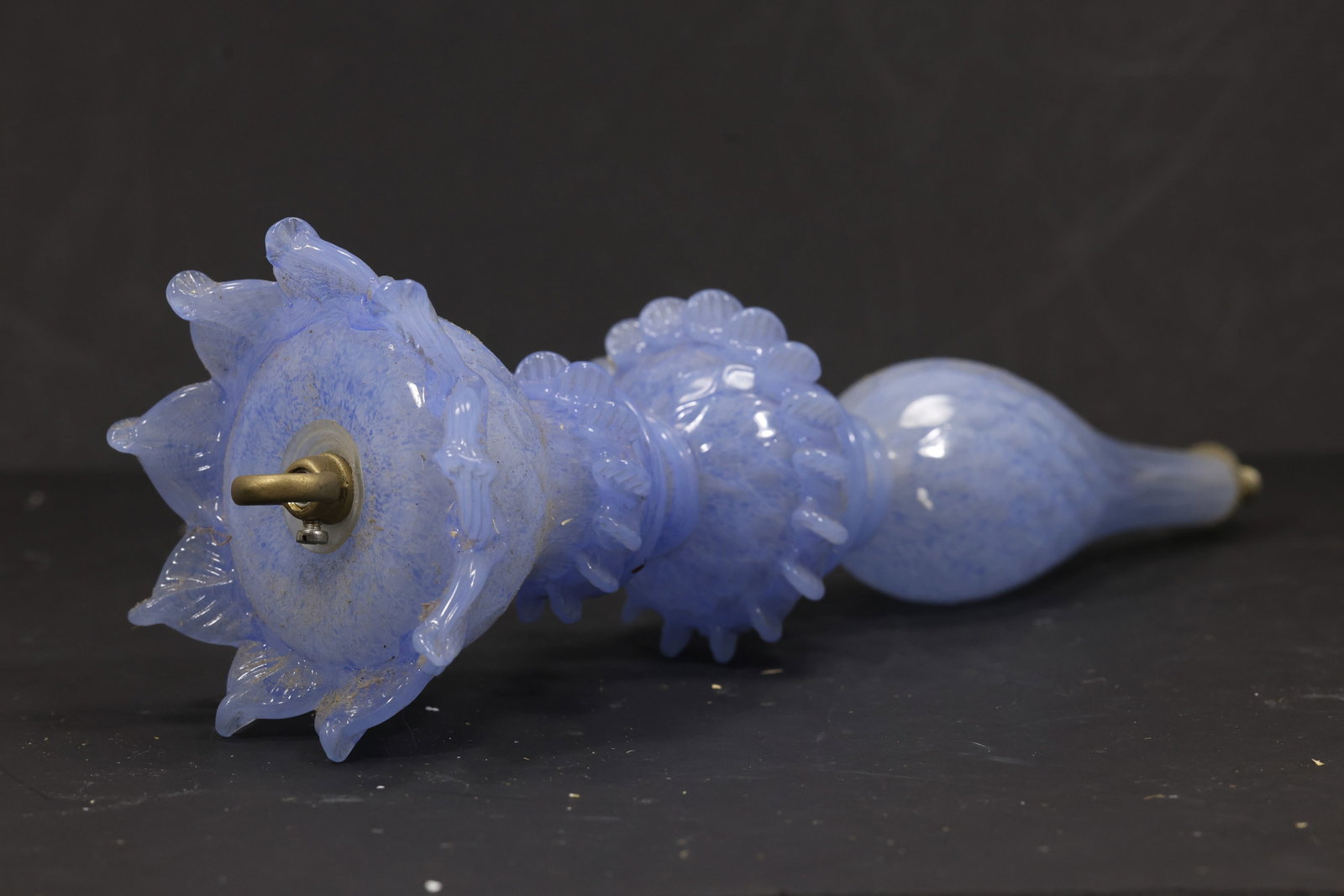 Blue and White Murano Glass Chandelier Floral Stem: Single vintage mid century Murano glass blue and white decorative chandelier stem from confirmed importer stock. The elongated component combines pale blue opaline glass a sculpted flower form and a t