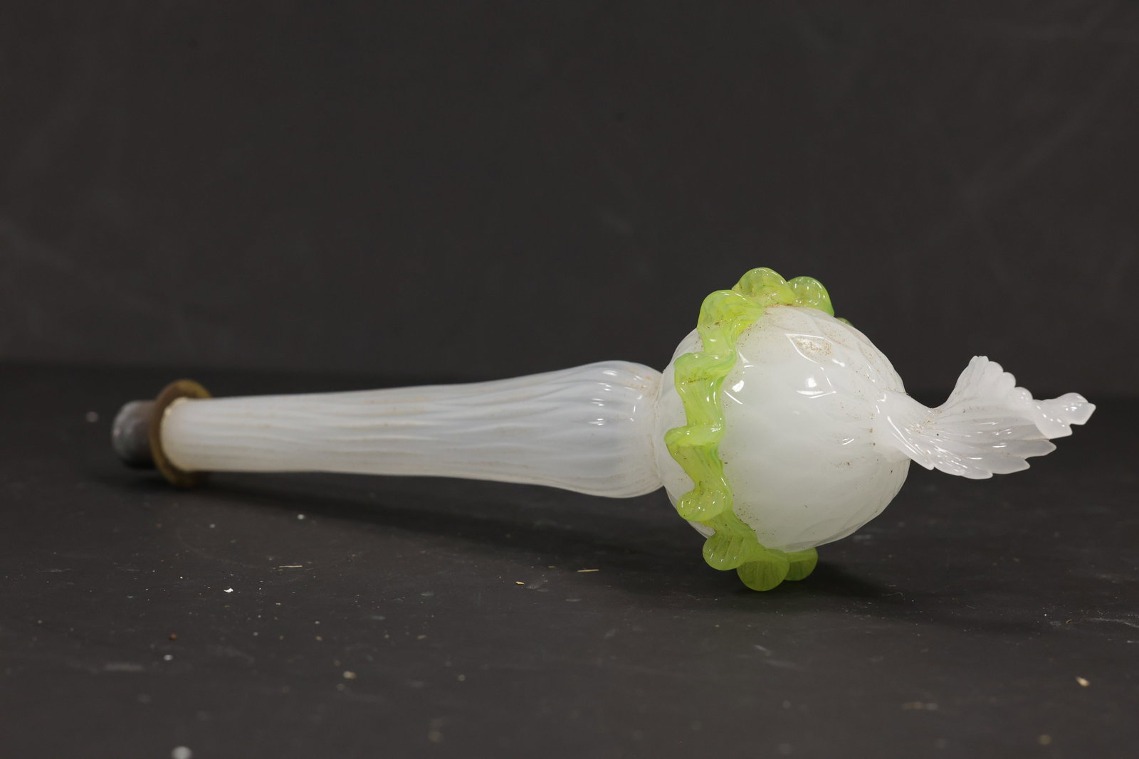 White and Green Murano Glass Chandelier Floral Stem: Single vintage mid century Murano glass white and green decorative chandelier stem from confirmed importer stock. The elongated opaline white component has a green flower form near the center and meta