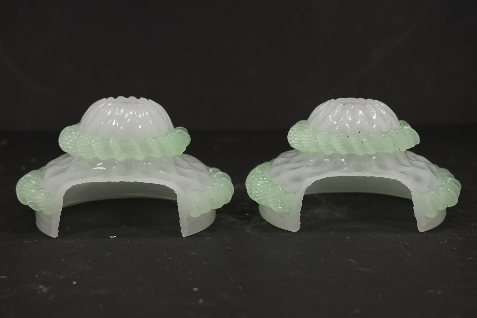 Pair Green and White Murano Glass Chandelier Bobeche Parts: Pair of vintage mid century Murano glass green and white chandelier bobeche or spacer parts from confirmed importer stock. Each low curved component combines opaline white glass pale green ribbing and