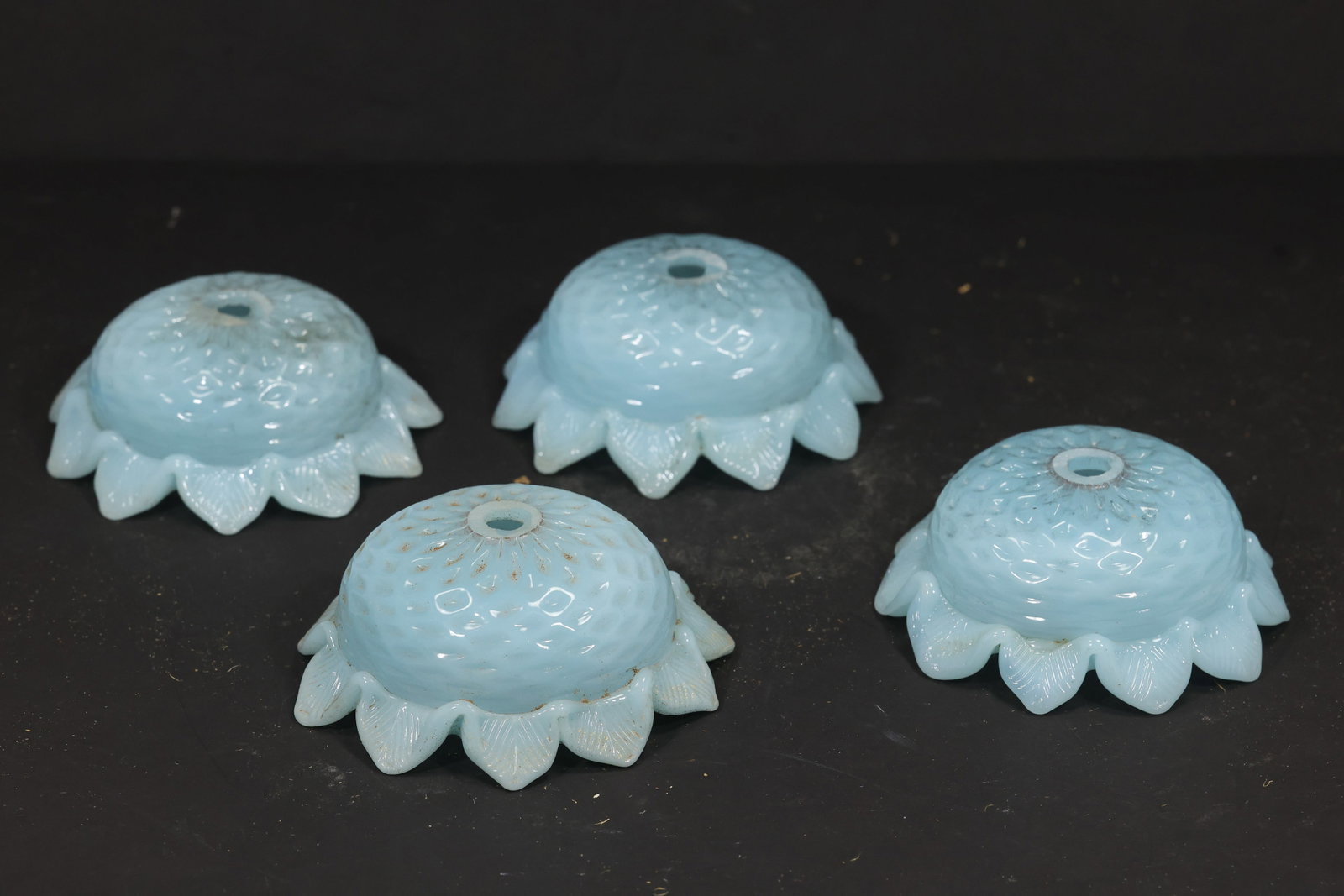 Set of Four Blue Murano Glass Flower Chandelier Shades: Set of four vintage mid century Murano glass blue flower form chandelier shades from confirmed importer stock. Each circular component has a domed center mounting aperture and radiating pointed petal 