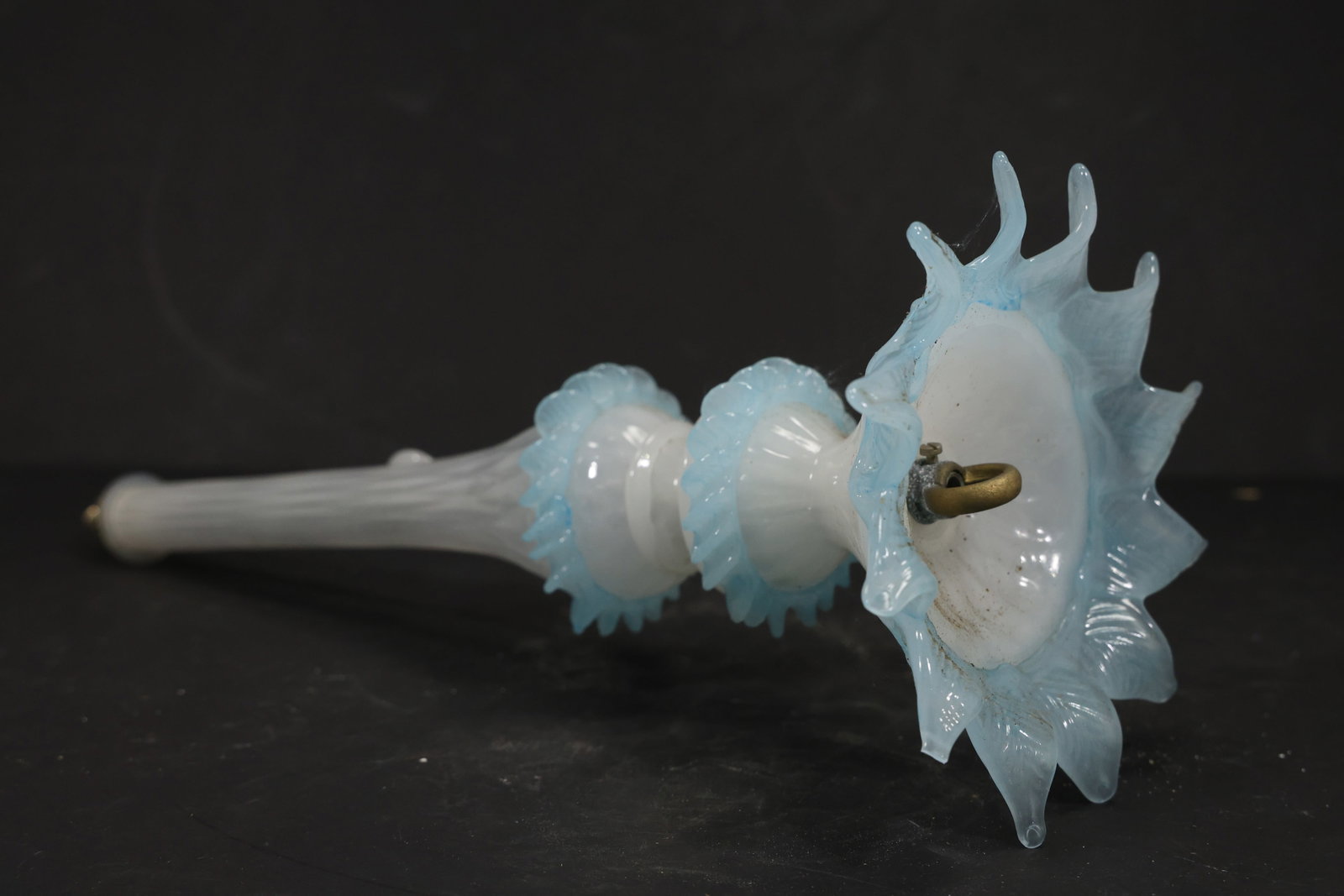 Blue and White Murano Glass Chandelier Floral Stem: Single vintage mid century Murano glass blue and white decorative chandelier stem from confirmed importer stock. The elongated component has an opaline white shaft pale blue ribbed knop and a wide blu