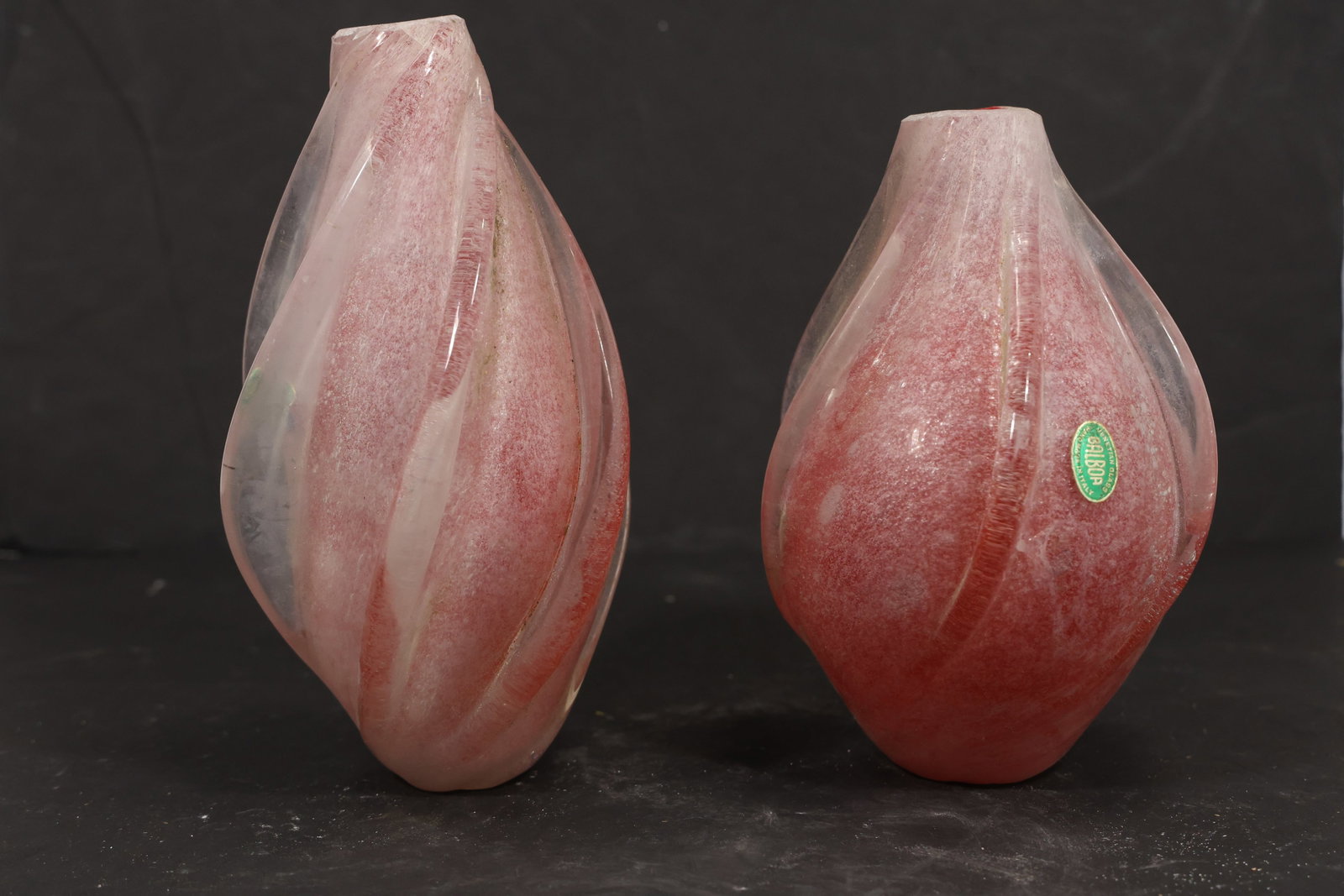 Pair Magenta Murano Glass Chandelier Column Covers: Pair of vintage mid century Murano glass magenta chandelier column covers or central elements from confirmed importer stock. Each elongated oval component has a tapered organic form soft vertical colo