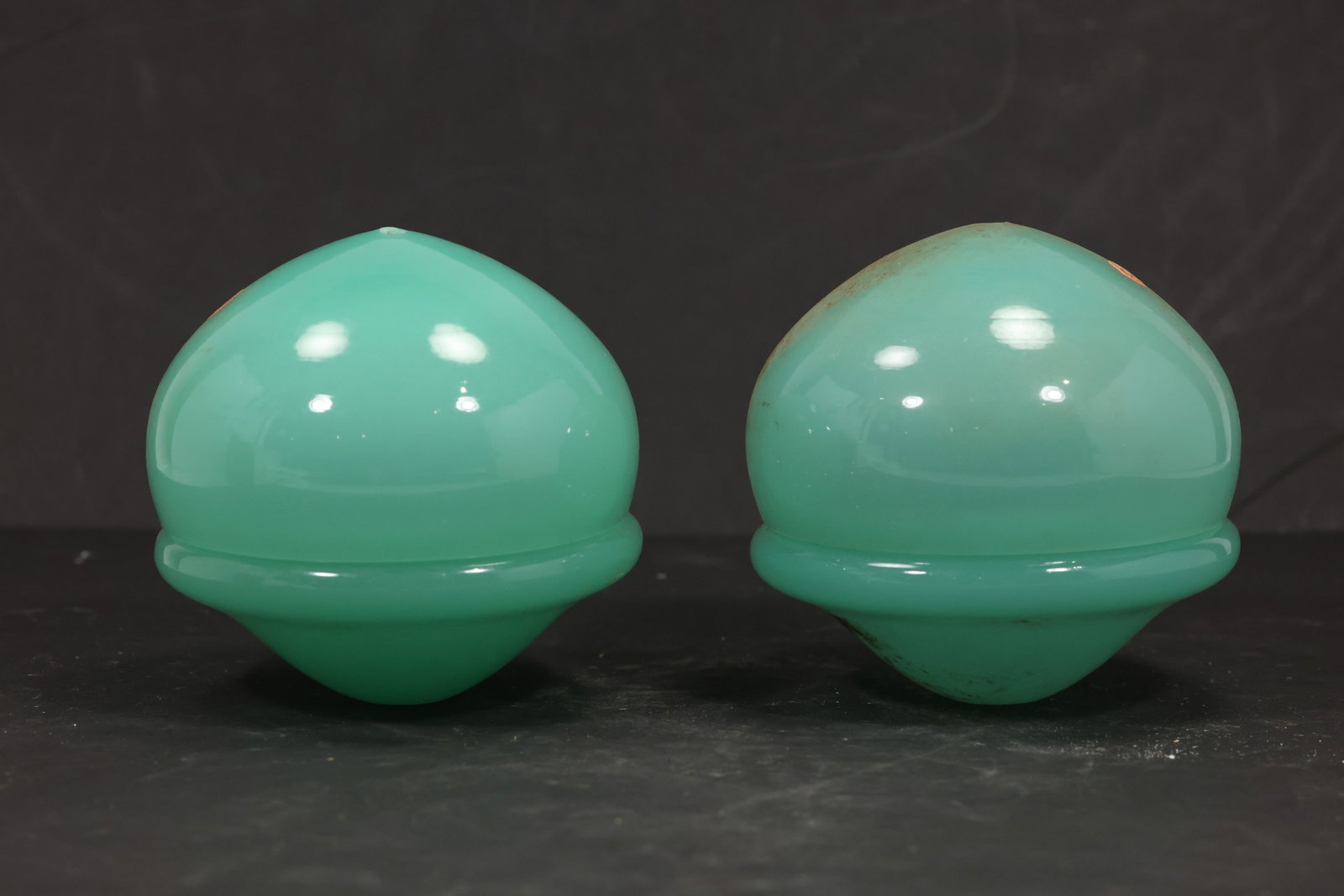 Pair Cyan Murano Glass Domed Chandelier Covers: Pair of vintage mid century Murano glass rounded domed chandelier covers from confirmed importer stock. Photographs show smooth spherical bodies with raised equatorial ribs and open undersides in cyan