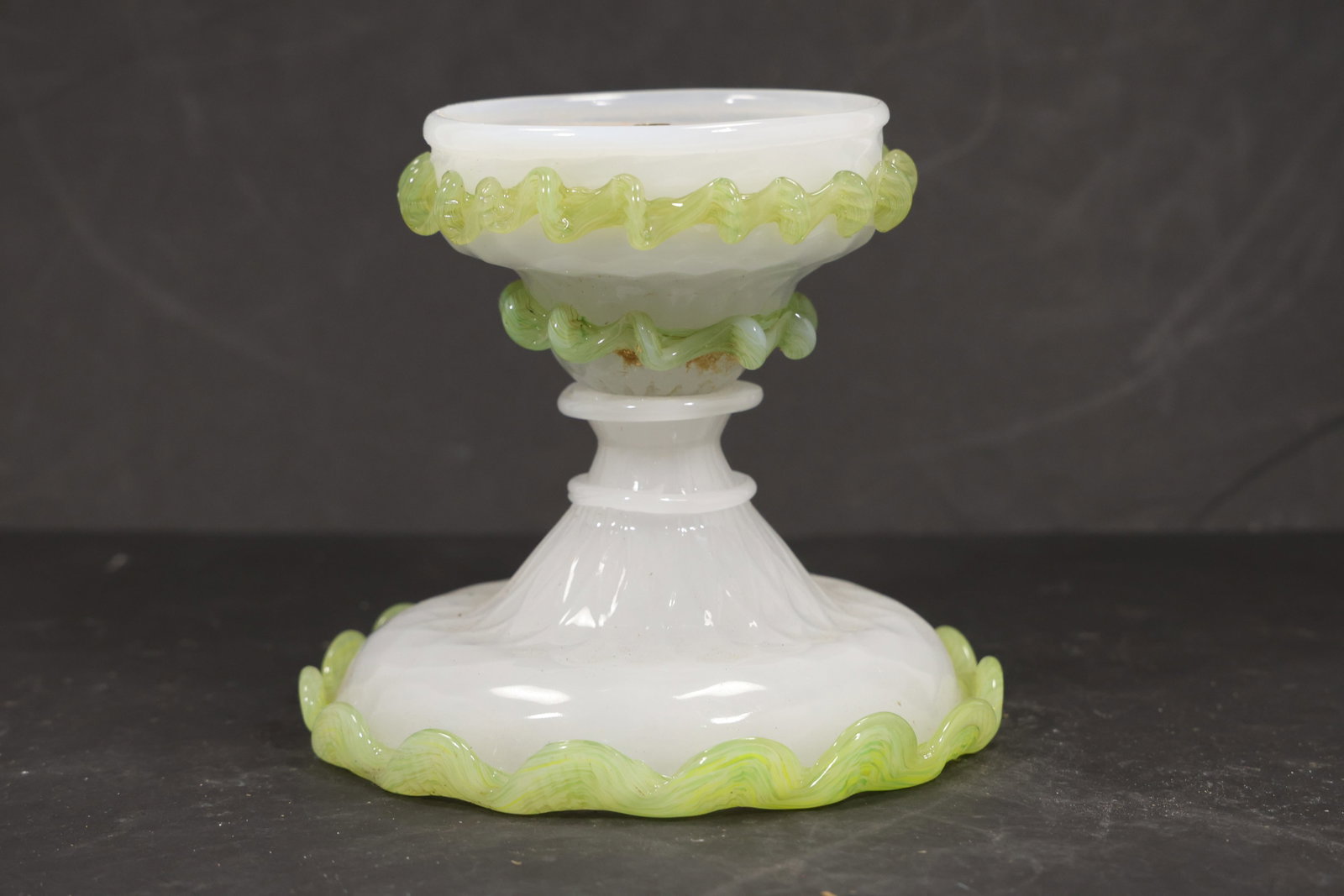 Green and White Murano Glass Chandelier Base Stand: Single vintage mid century Murano glass decorative chandelier base stand from confirmed importer stock. Photographs show stacked pedestal sections with molded floral and ribbed ornament in green and w