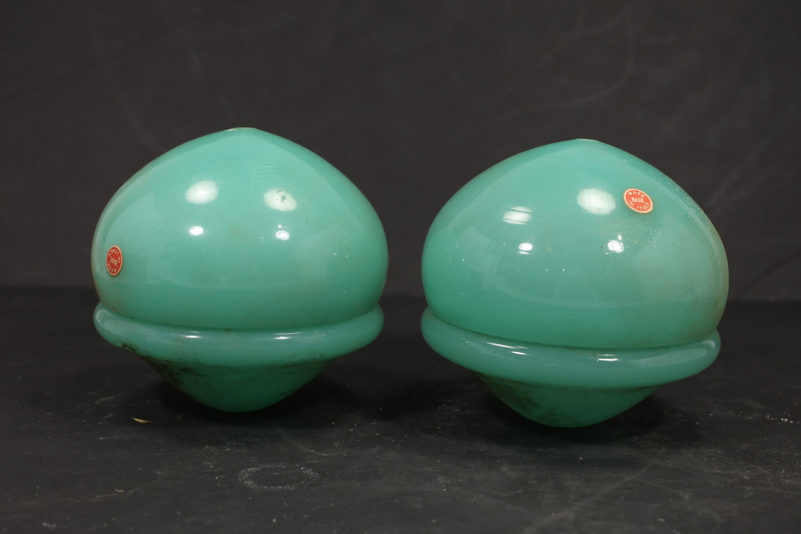 Pair Cyan Murano Glass Domed Chandelier Covers: Pair of vintage mid century Murano glass rounded domed chandelier covers from confirmed importer stock. Photographs show smooth spherical bodies with raised equatorial ribs and open undersides in cyan