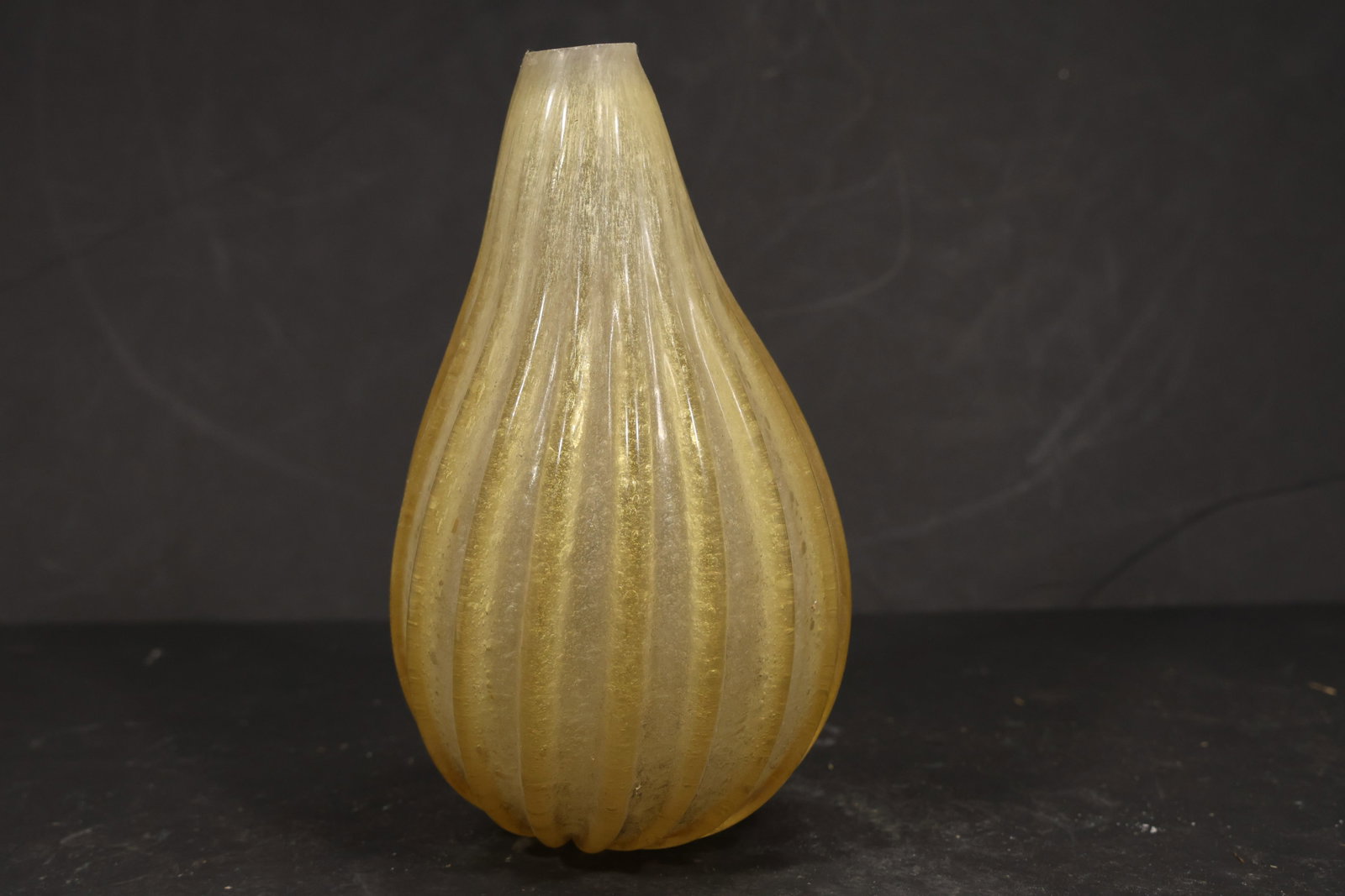 Amber Yellow Murano Glass Chandelier Bottom Finial: Single vintage mid century Murano glass chandelier bottom finial or lower decorative element from confirmed importer stock. Photographs show a sculpted body with central fitting for a chandelier assem