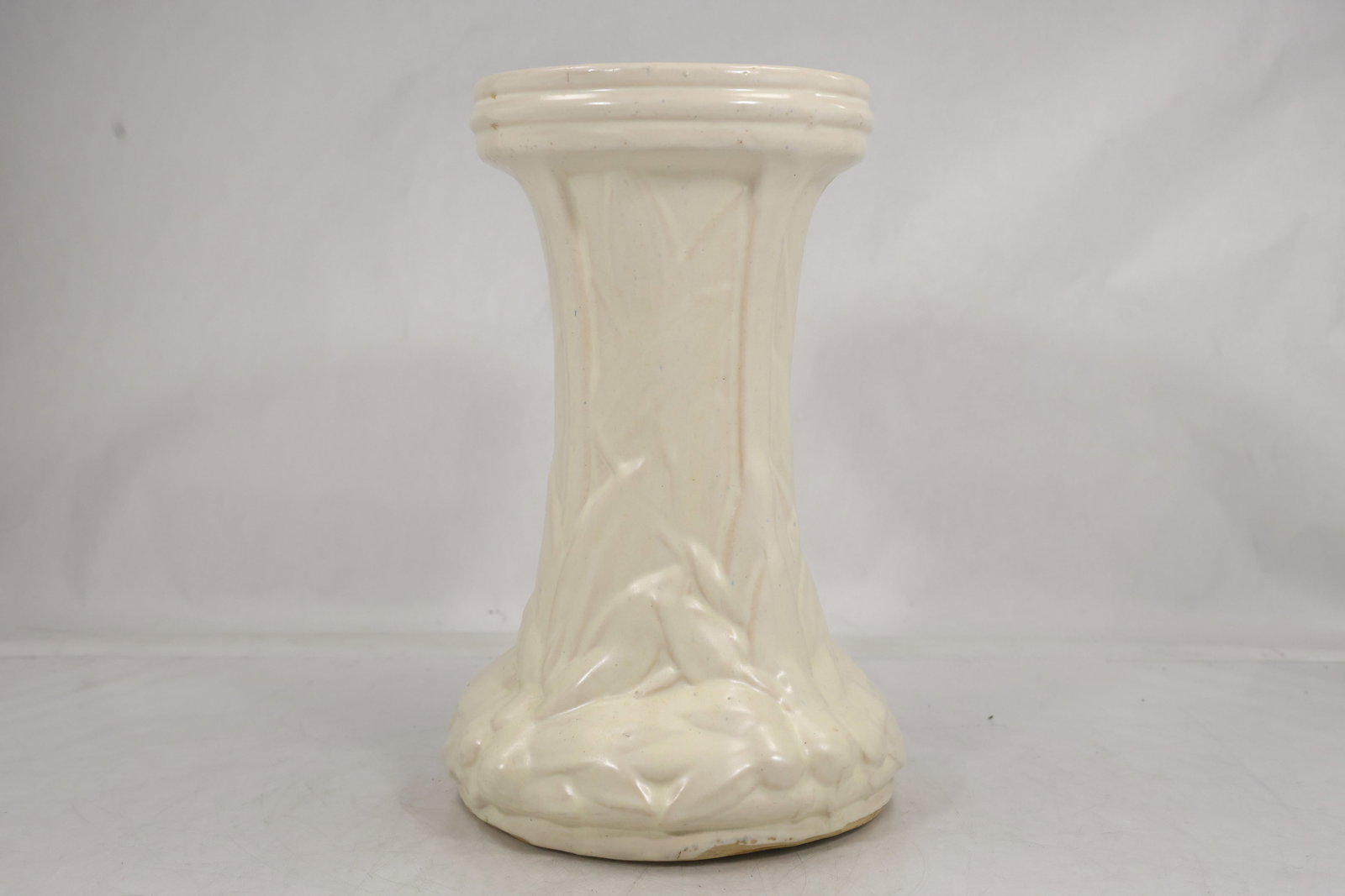 Mid Century Style Studio Pottery White Glaze Plant Stand: Mid Century Style Studio Pottery White Glaze Plant Stand size: 13h 7.5w S:F** Important Auction information:**** All lot descriptions in this auction were generated using artificial intelligence pilot