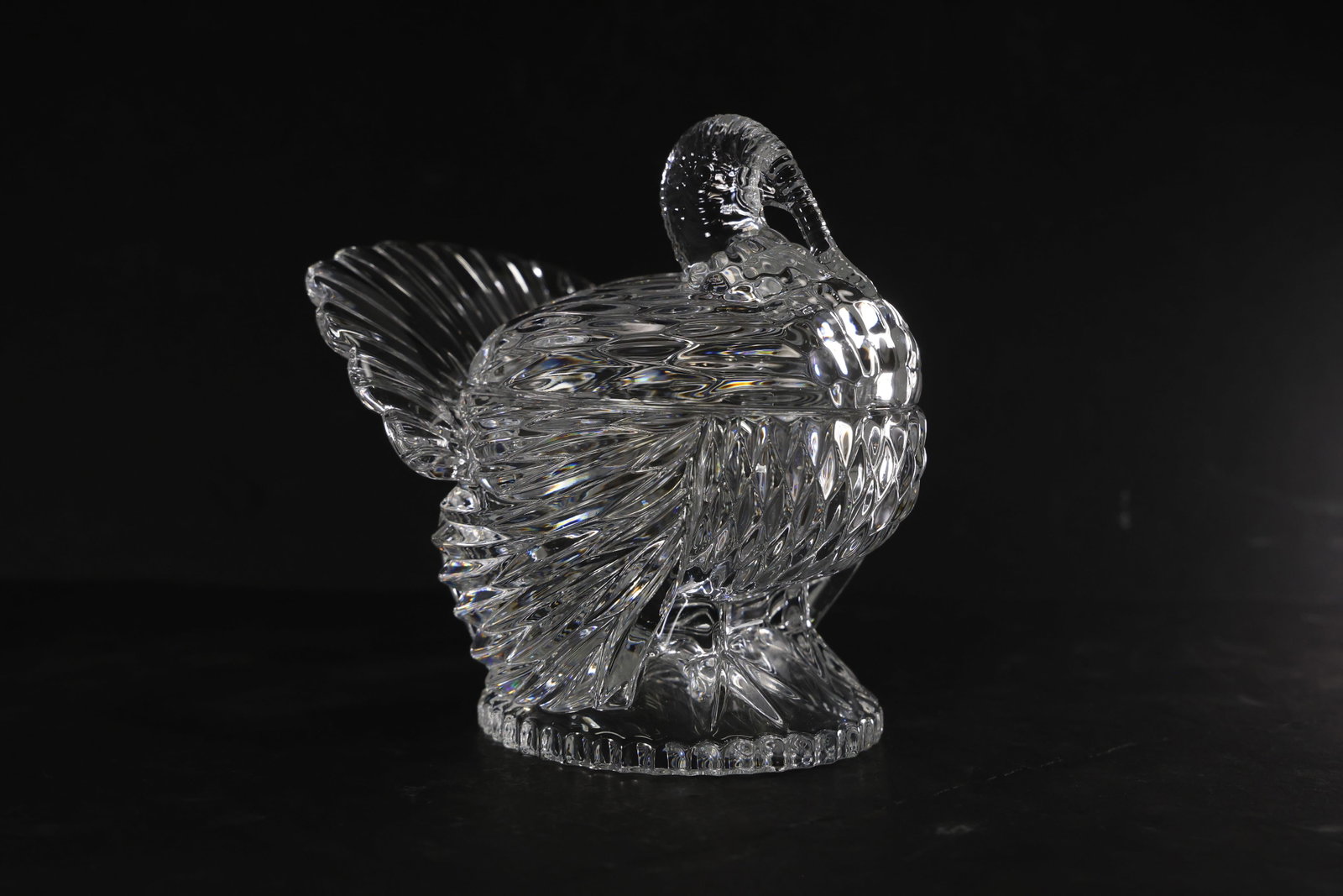 Signed Waterford Crystal Turkey Covered Dish: Elegant Waterford crystal covered dish in the form of a turkey, finely cut with radiating fan and diamond patterns that catch light from every angle. The sculptural form features a detailed head and t
