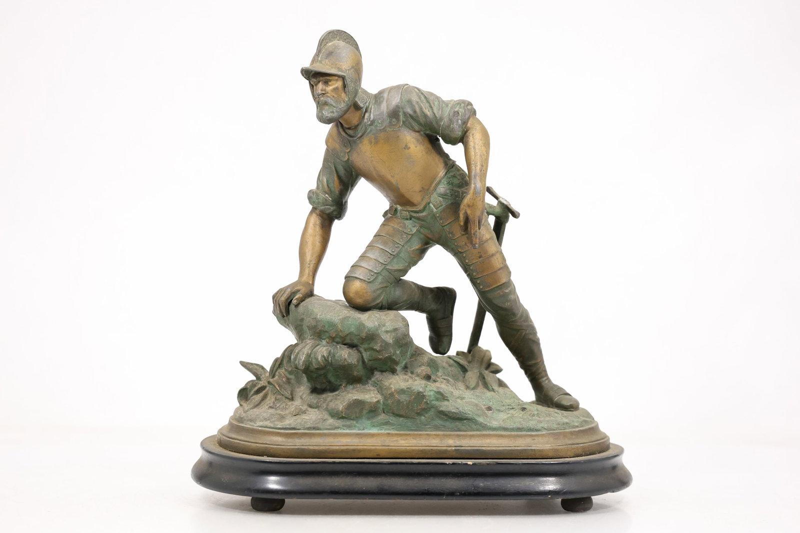Bronze Tone Uffizi Wrestlers Sculpture After the Antique: Bronze tone figural sculpture depicting two nude male athletes in a dynamic wrestling pose on a shaped base. The composition corresponds to the Uffizi Wrestlers an ancient Roman marble group after a H