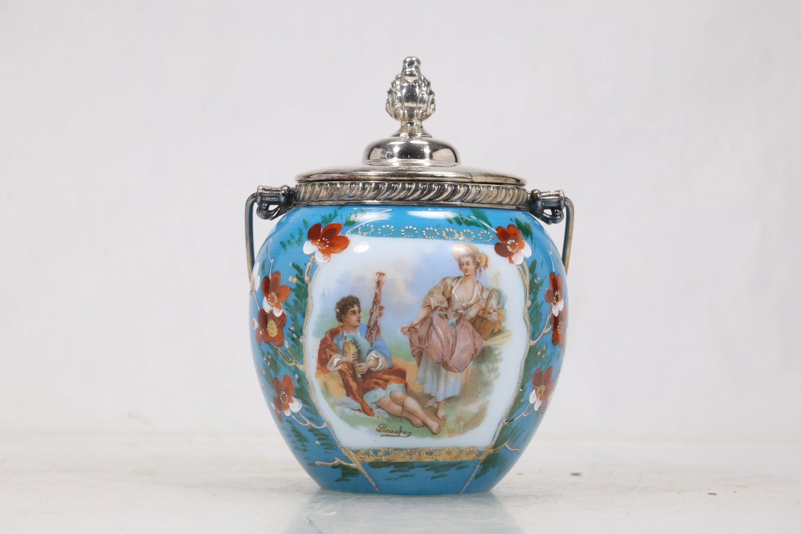 Chinese Style Painted Porcelain Lidded Jar: Lidded porcelain jar with turquoise ground figural cartouches red floral accents and gilt borders. The rounded body and domed cover use dense Chinese export style decoration. The decoration relates