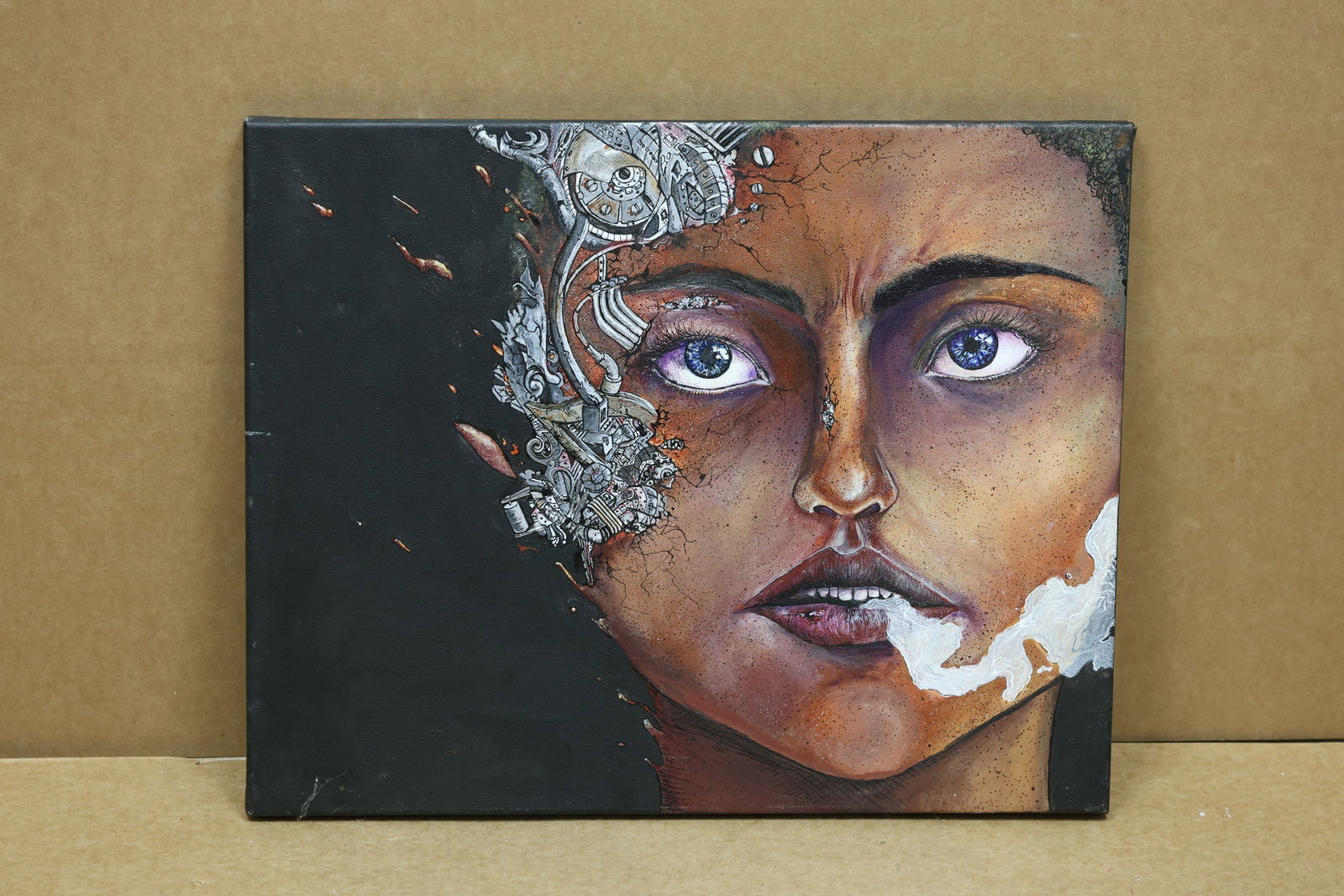 Surreal Woman and Mechanical Parts Painting on Canvas: Square painting on canvas depicting a womans face merged with gears tubing and other mechanical forms in a muted brown and gray palette. The work is unmarked in the reviewed photographs. The simplifie