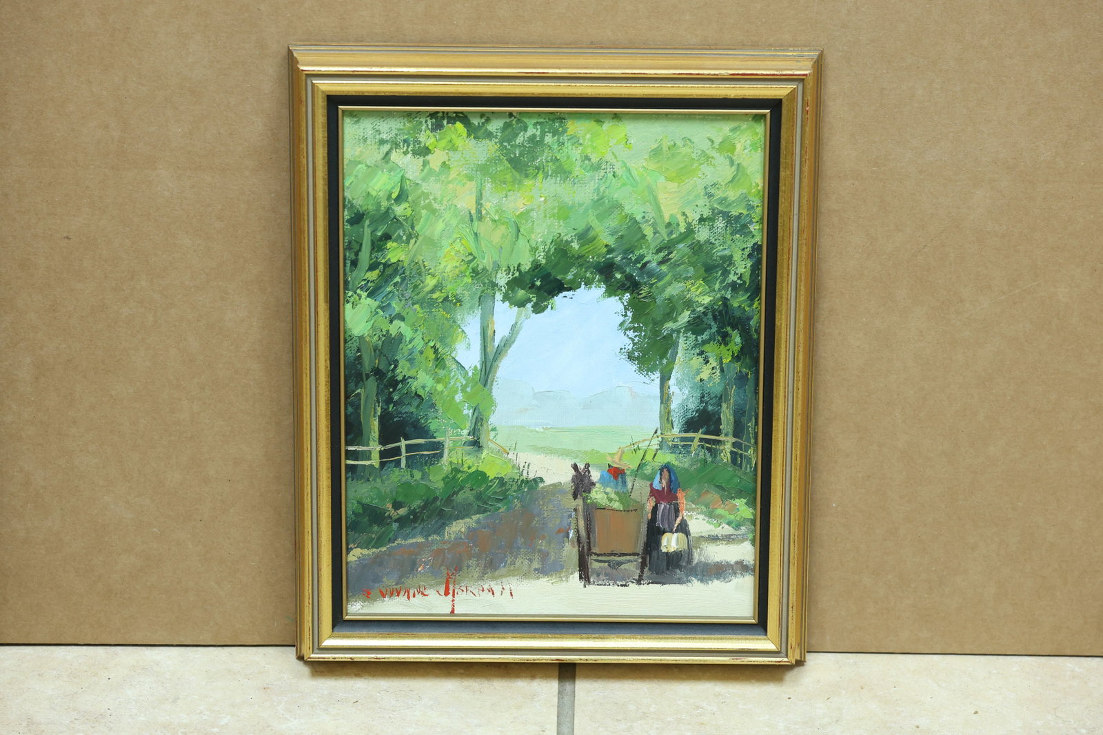 J Wynne-Morgan Woman with Donkey Rural Impasto Painting: Framed impasto painting depicting a woman beside a donkey and cart on a tree covered rural path. The work is signed J Wynne-Morgan. The broken color and atmospheric handling relate to Impressionist la