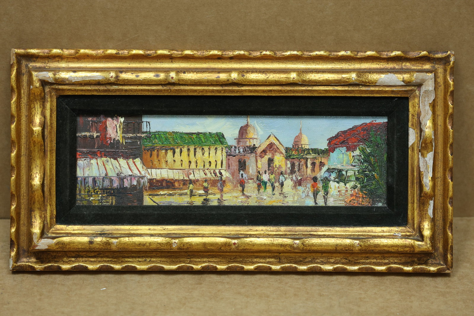 P G Tiele Colorful Domed City and Market Painting: Small framed city or market scene with clustered figures architecture and domed buildings in bright colors. The faint signature appears to read P G Tiele. The direct forms and narrative presentation r