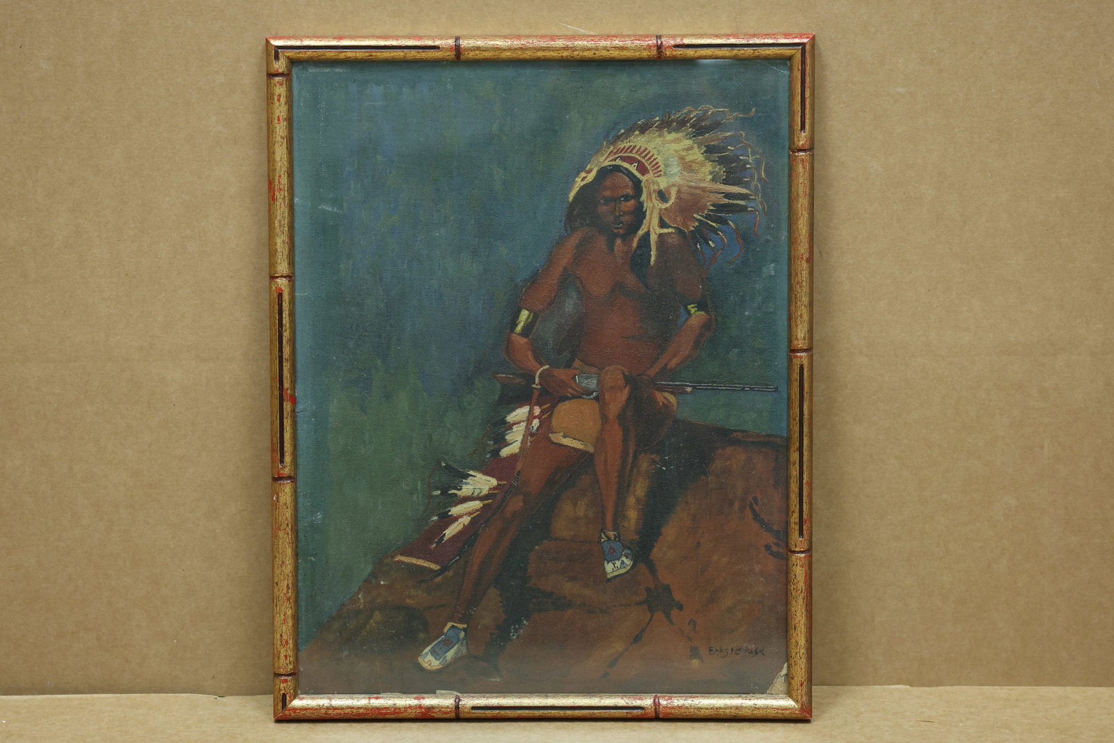 Erngidouse Native American Man in Headdress Portrait: Framed portrait painting depicting a seated Native American man wearing a feather headdress. The lower signature appears to read Erngidouse and may alternatively read Engidouse. The subject relates to