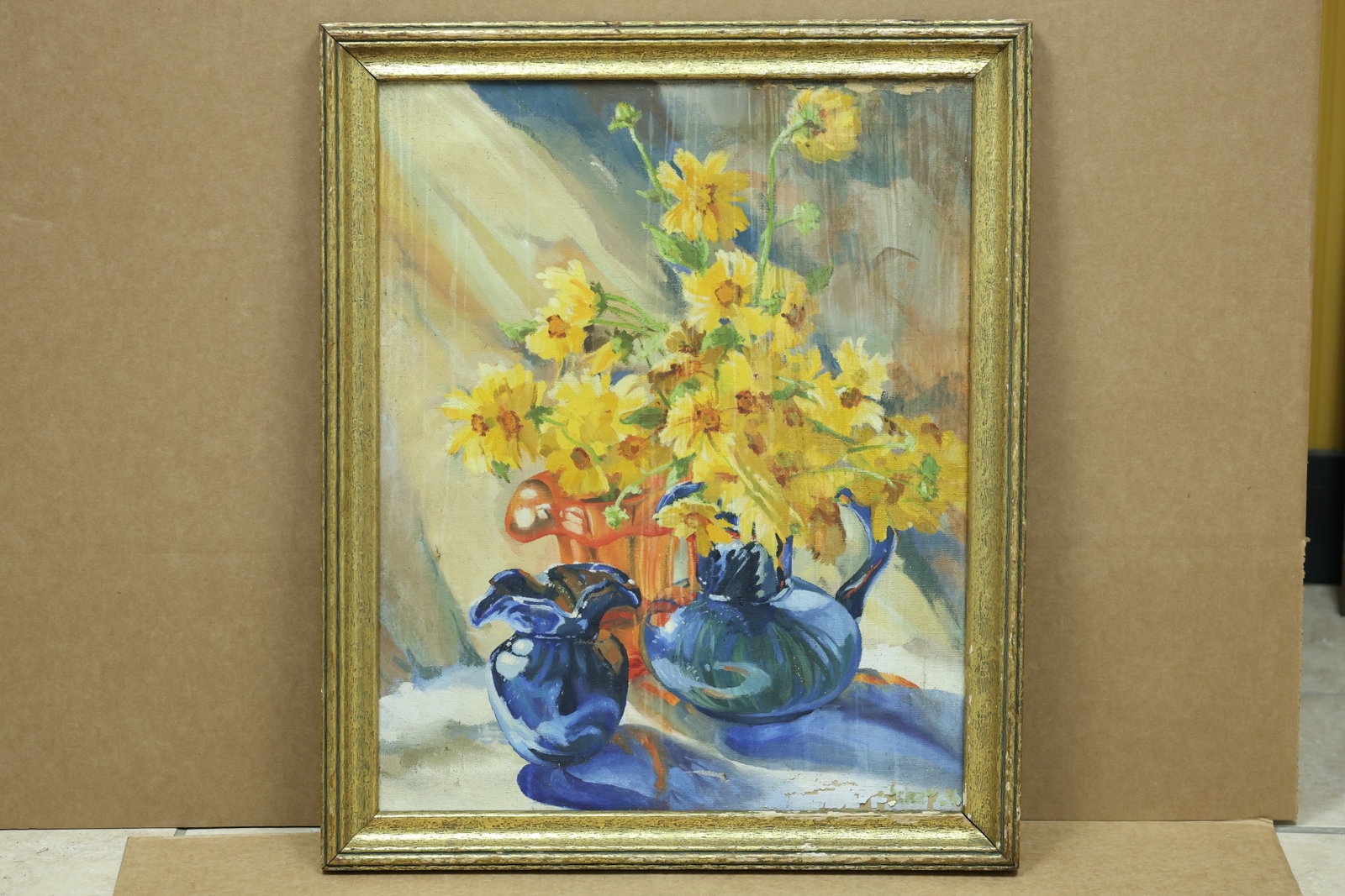 Eleanor S Archer Blue Glass Afternoon Floral Painting: Framed floral still life painting depicting yellow flowers with blue glass vessels. The reverse identifies Eleanor S Archer and the title Blue Glass Afternoon with a Collingswood New Jersey address. T