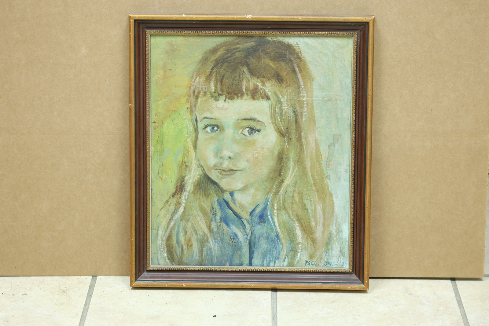 Peggi Smith 1976 Portrait of a Young Girl: Framed portrait painting on board depicting a young girl in a patterned garment. The work is signed Peggi Smith and dated 76. The simplified figure and expressive color relate to modern figurative art