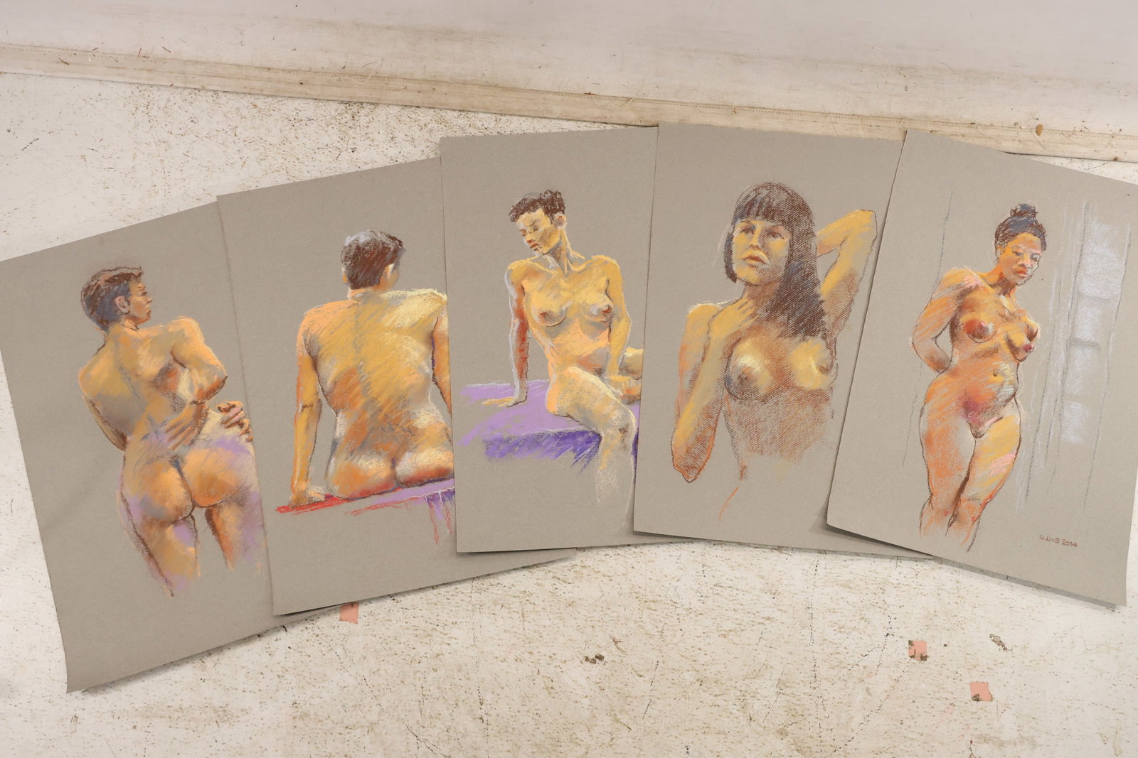Group of Five Seated Standing and Curled Nude Pastel Studies by Unidentified Artist: Group of five pastel figure studies on paper by an unidentified artist depicting seated standing and curled female nude models including a red haired figure. Each work is dated and unsigned. No artist