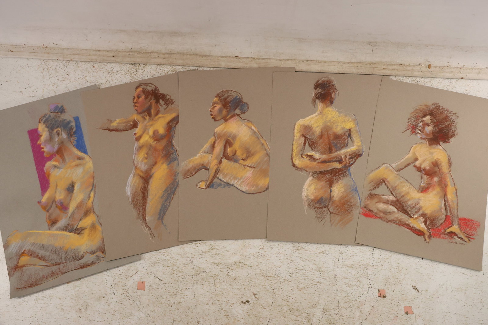 Group of Five Red Haired Model Nude Pastel Studies by Unidentified Artist: Group of five pastel figure studies on paper by an unidentified artist depicting female nude figure studies centered on a red haired model with warm orange and red pastel passages. Each work is dated 
