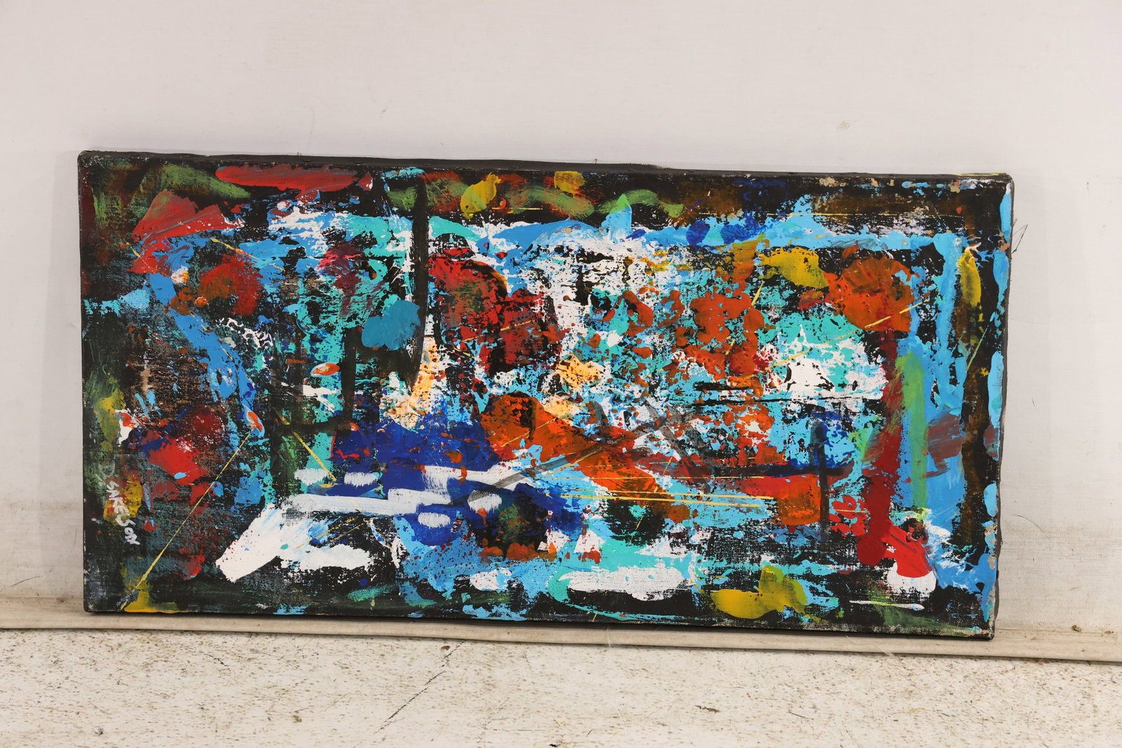 Signed D Sakelson Colorful Abstract Painting on Canvas: Original abstract painting on canvas signed D Sakelson on the back. Layered blue red orange white and black marks create a dense horizontal field with scraped and splattered texture. The energetic sur