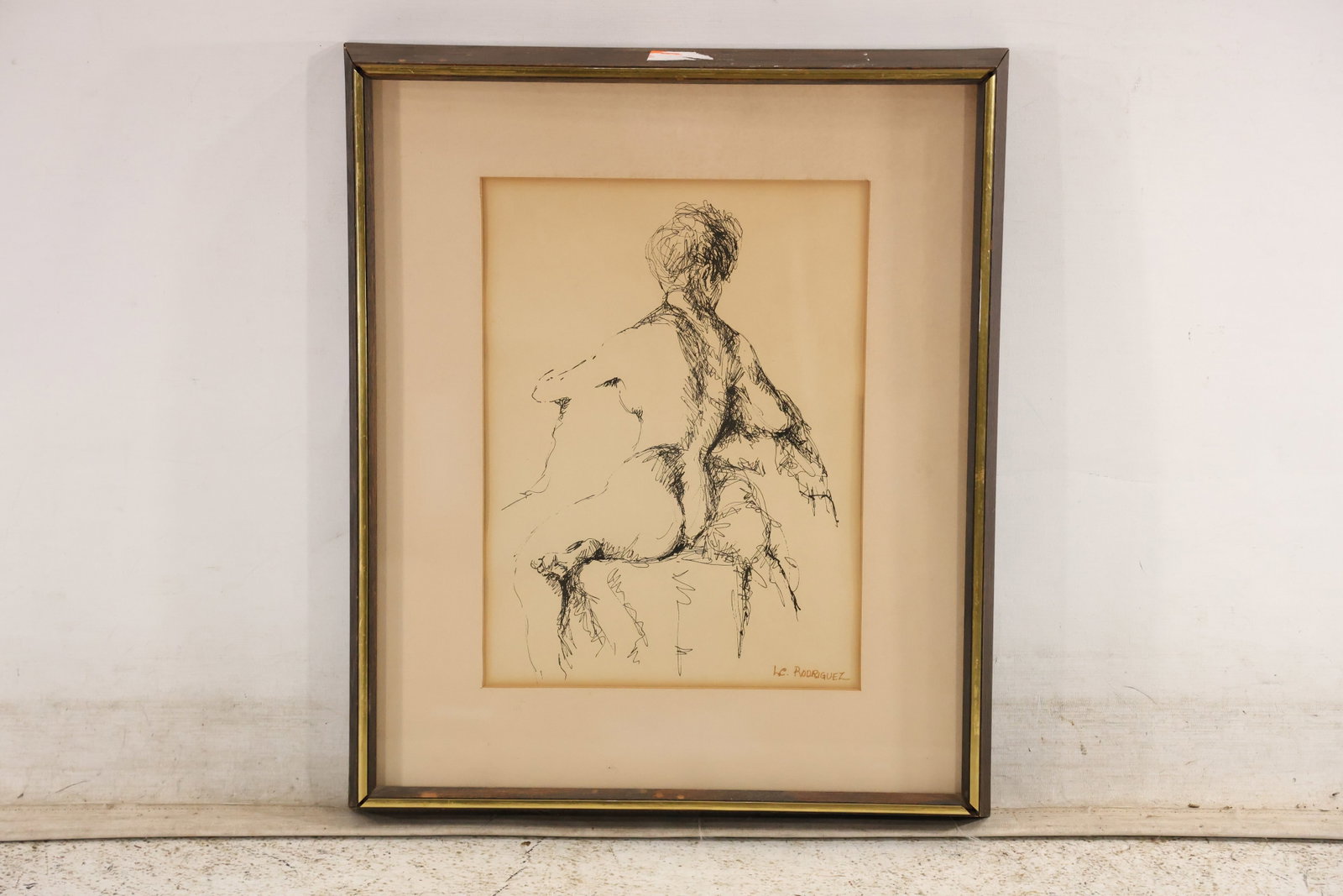 Signed LC Rodriguez Figurative Ink Drawing: Original black ink drawing on paper signed LC Rodriguez at the lower right. A seated or crouching figure is described through rapid broken lines with large areas of open paper. The compressed pose