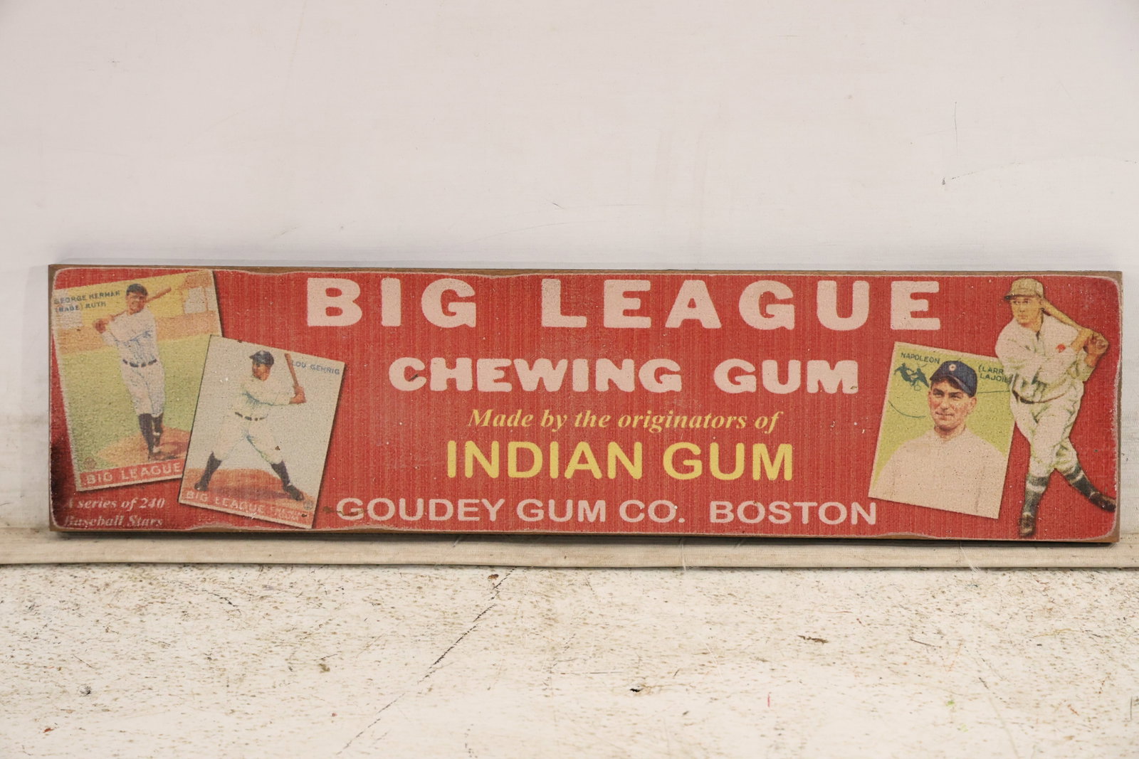 Goudey Big League Chewing Gum Novelty Wood Sign: Vintage style novelty sign printed on wood reproducing a Big League Chewing Gum advertisement associated with the Goudey Gum Company of Boston. Baseball players and bold red white and green lettering 