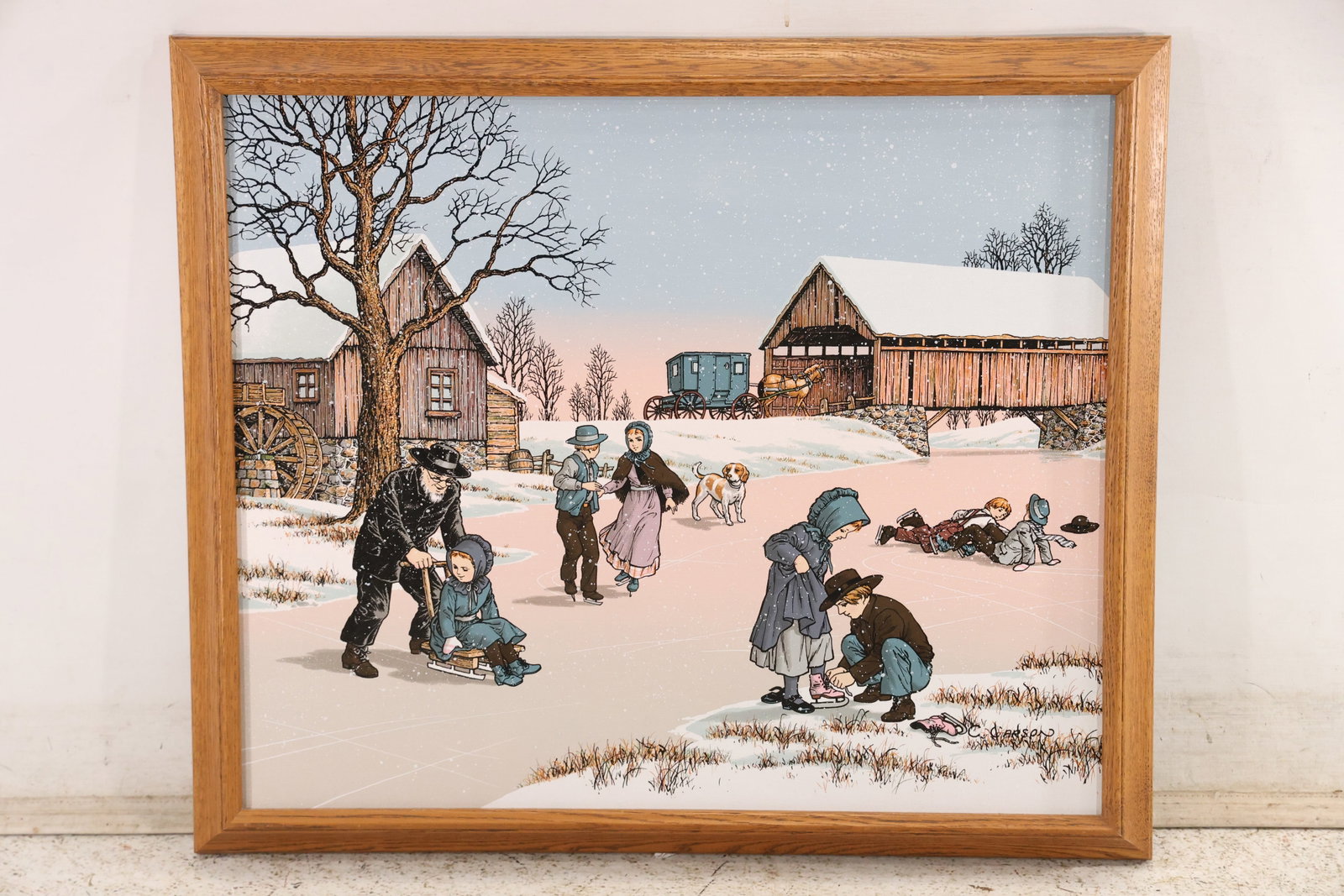 Signed C Carson Amish Winter Serigraph Print: Color serigraph signed C Carson and titled Amish Winter or a closely related title. The rural scene depicts Amish families and children gathering beside snow covered barns and farm buildings. The deta