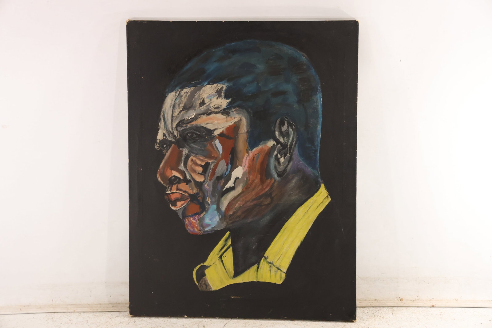 Signed LeRoy Clarke Afro Caribbean Male Portrait Painting: Original painting on canvas associated with Afro Caribbean artist and poet LeRoy Clarke. The portrait presents a male head in layered blue brown white and red strokes on a black field and a personal m