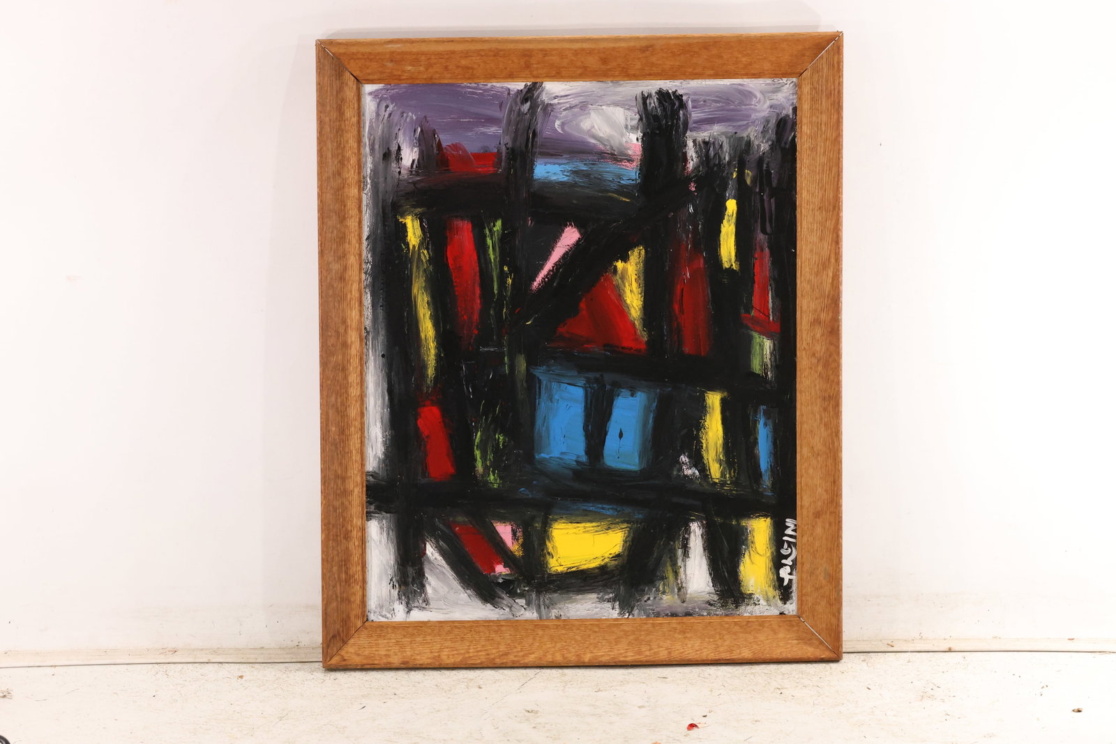 Signed Tom Pulgini Gestural Abstract Oil Painting: Signed Tom Pulgini oil painting on board depicting an energetic abstract composition built from black linear divisions and layered strokes of red yellow blue and white within a natural wood frame. The