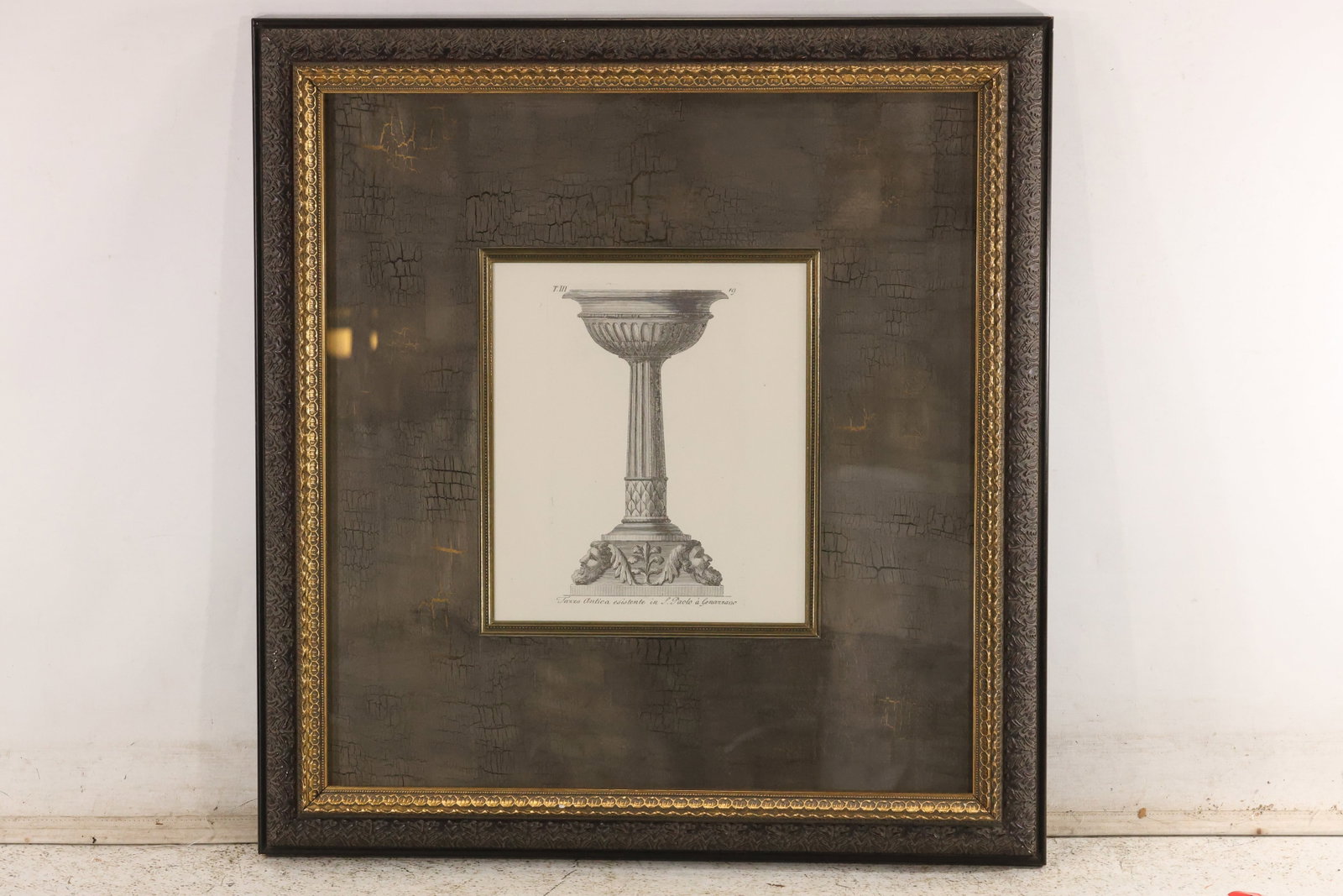 John Richard “Tazza Antica?? Genazzano Urn Print: Framed classical antiquities print depicting an urn or pedestal. Italian caption reads “Tazza Antica esistente in S. Paolo à Genazzano.” John Richard label on reverse. Outside frame measures 