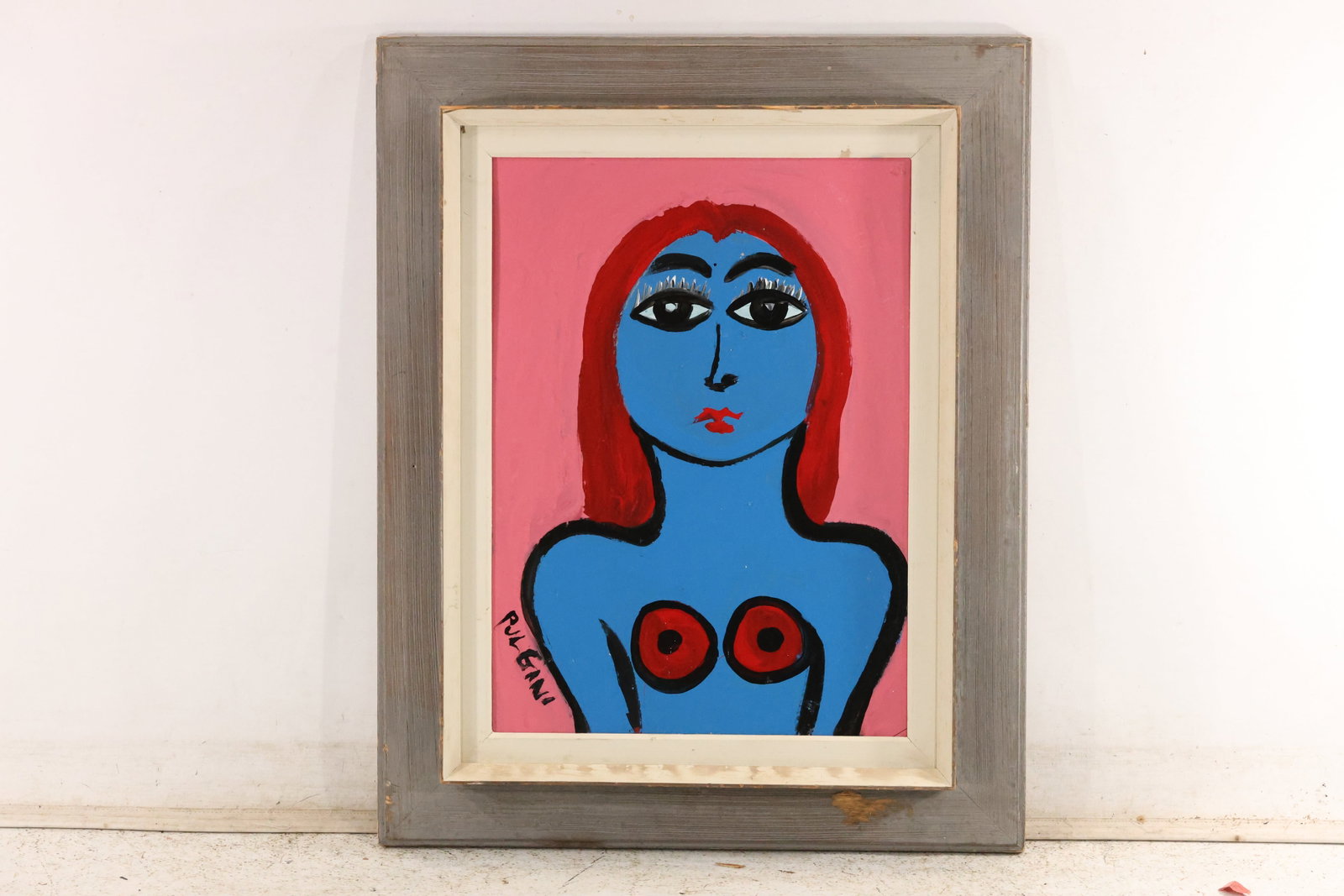 Thomas Pulgini Blue Figure on Pink Painting: Original painting by Thomas Pulgini. A blue figure with long red hair, large eyes, and red circular accents against a pink background. Presented in a light-colored frame. Size: 22 x 16 inches. Outside