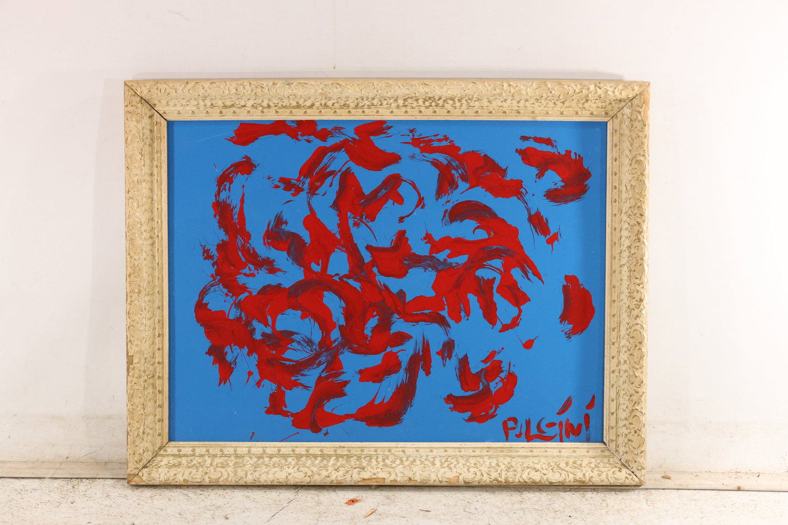 Thomas Pulgini Red Abstract Forms on Blue Painting: Original painting by Thomas Pulgini. Loose red organic marks and shapes spread across a blue background. Presented in an ornate light gold-toned frame. Size: 18 x 24 inches. Outside frame measures 26 