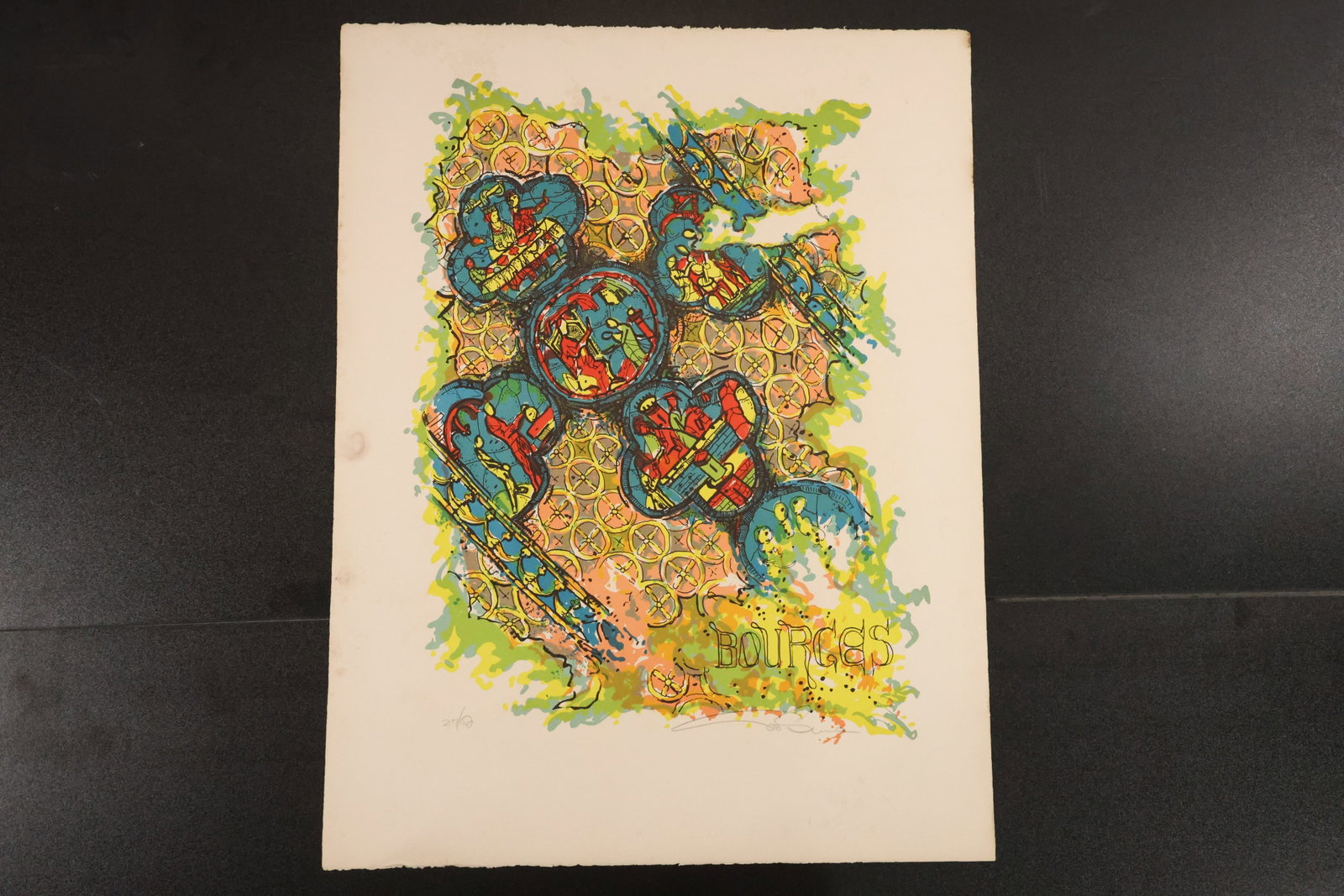 Signed “Lourdes?? Color Print: Color print with layered circular and architectural forms in green, blue, yellow, and red. The composition includes the word “Lourdes.” Signed at lower right. Size: 26 x 20 inches. Shelf ID: m