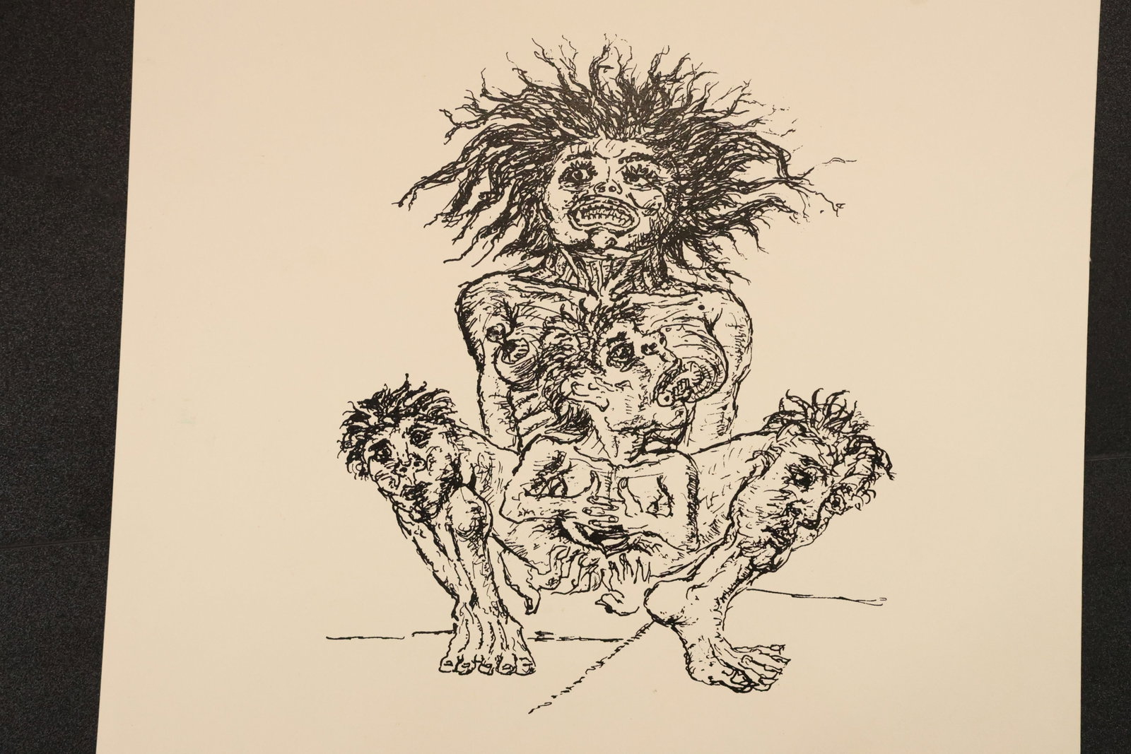 Fantastic Wild-Haired Figure Black-and-White Print: Black-and-white print depicting a crouching fantastic figure with wild hair and expressive facial forms worked into the torso and limbs. Printed with broad paper margins. Size: 25.5 x 18 inches. Shelf