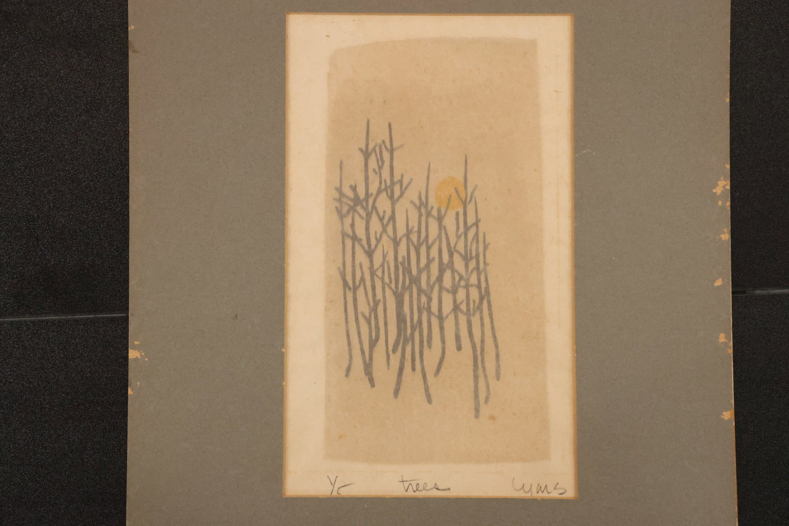 Limited Edition Abstract Trees Print, 1/5: Small print depicting a cluster of slender, closely spaced trees with dark linear trunks and a yellow accent. Numbered 1/5 and presented with a dark mat. Size: 11 x 6.5 inches; outside mat: 19 x 14 in