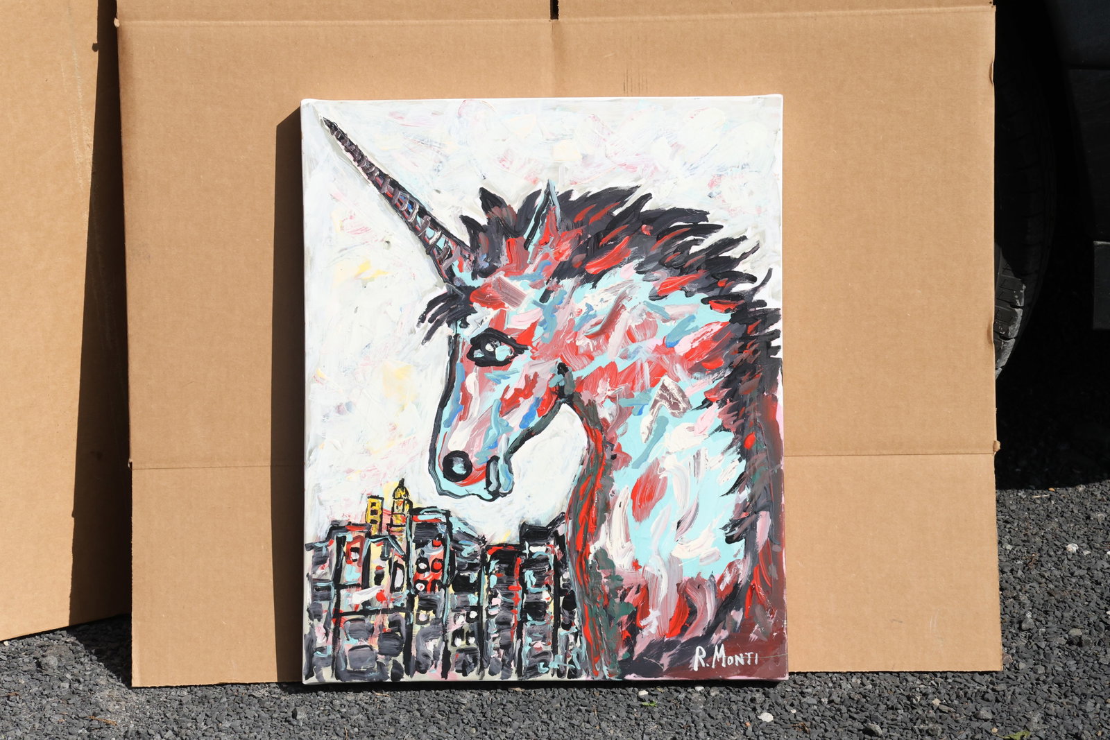 Rocco Monticolo (R. Monti) Unicorn above a Cityscape Painting: Original painting by Rocco Monticolo (R. Monti). A large unicorn head with a pointed horn and colorful mane rising above a tightly grouped cityscape. Size: 20 x 24 inches. Shelf ID: SU1 S4 **Pickup No