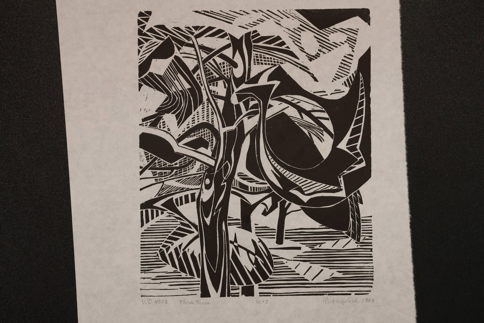 R. Angeloch Black and White Abstract Botanical Relief Print: A black and white relief print by R. Angeloch on thin paper. Angular leaves, rounded forms, and tightly spaced lines create a dense abstract botanical composition. Size: 18 x 12 inches. Shelf ID: mc4 
