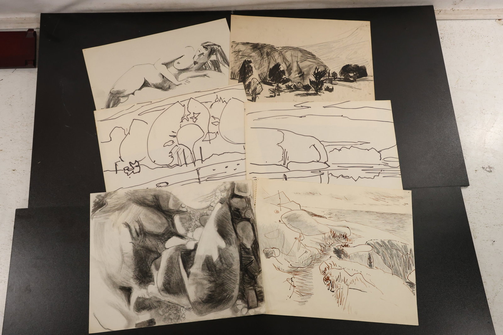 R. Angeloch Group of Landscape and Still Life Drawings: A group of drawings on paper by R. Angeloch featuring rolling landscapes, outlined trees, and a shaded bottle still life. Includes the works pictured together. Size: 14 x 17 inches. Shelf ID: abx **Pi