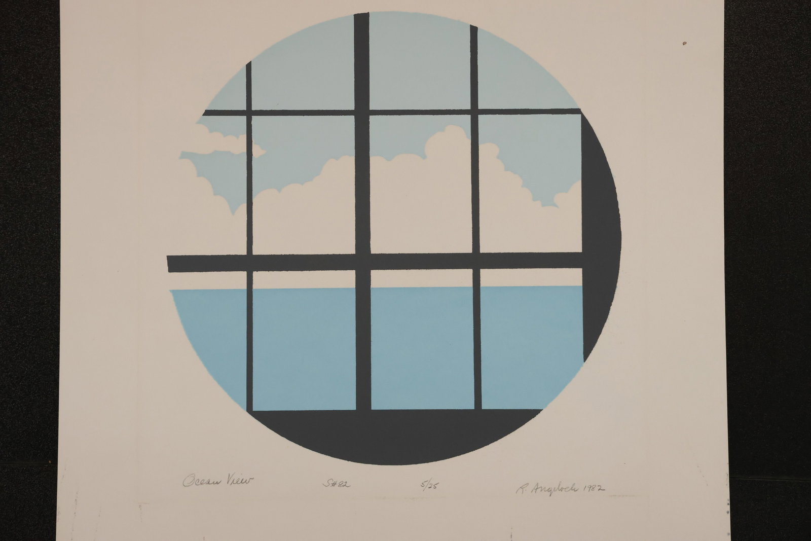 R. Angeloch Circular Window and Sky Color Print: A color print by R. Angeloch showing blue sky and pale clouds through a circular window divided by dark mullions. Pencil inscriptions appear below the image. Size: 15 x 13 inches. Shelf ID: mc4 **Pick
