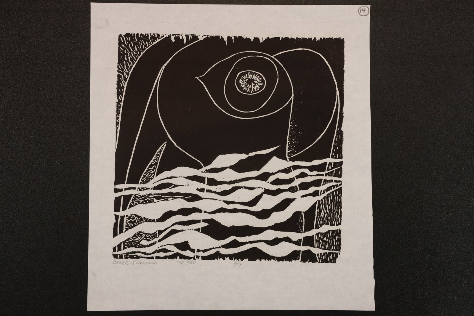 R. Angeloch Black and White Abstract Sea and Sky Relief Print: A black and white relief print by R. Angeloch on thin paper. Broad curved lines and a concentric circular form rise above sharply cut wave patterns. Size: 12 x 11 inches. Shelf ID: mc4 **Pickup Notice