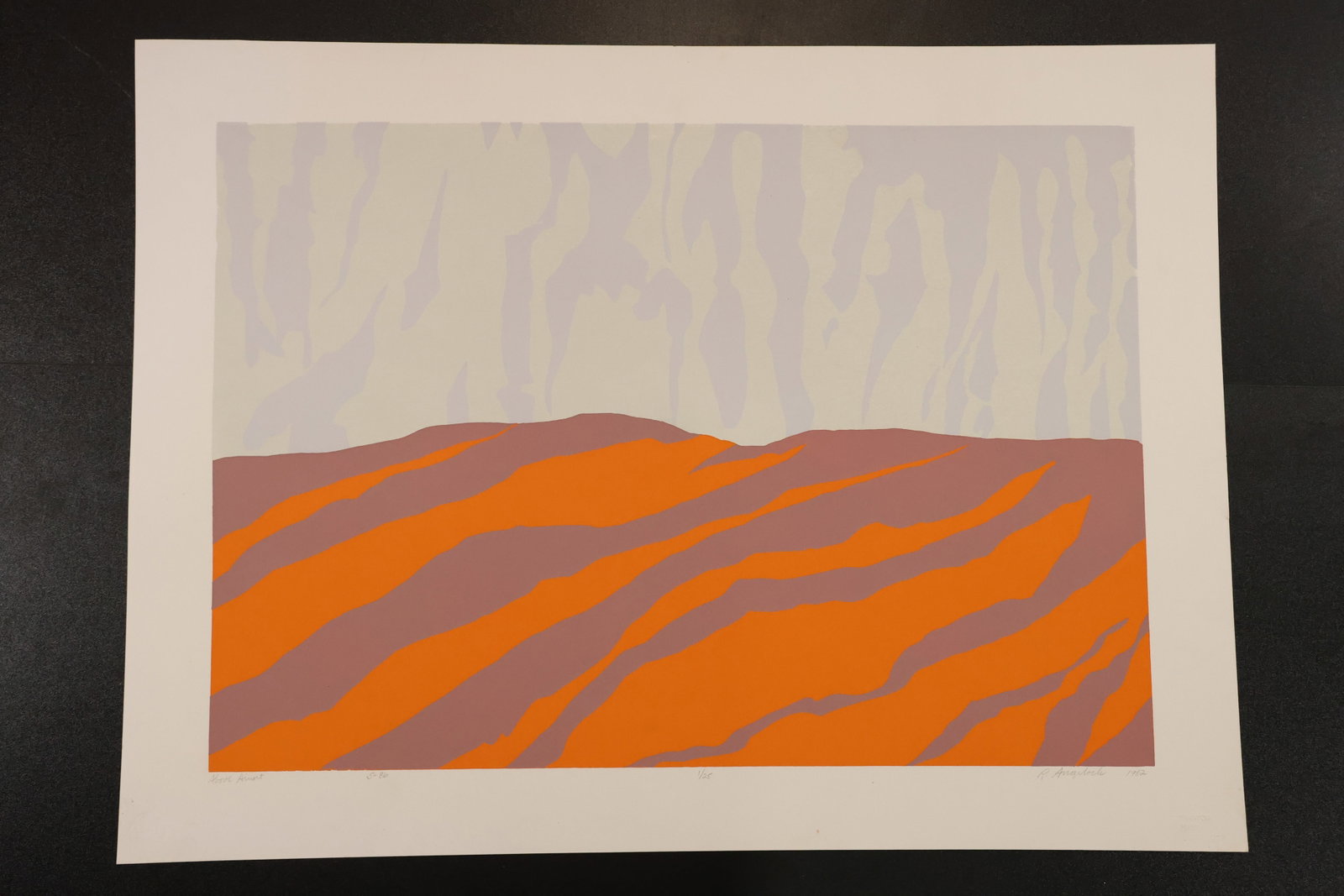 R. Angeloch Orange and Purple Landscape Color Print: A color print by R. Angeloch featuring rolling orange and muted purple bands beneath a pale, vertically patterned sky. Broad simplified shapes give the landscape an abstract character. Size: 20 x 27 i