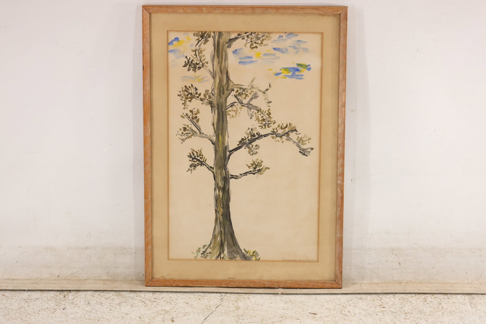 Phyllis Christle Signed Tree Watercolor: A watercolor and opaque-color tree study signed "Phyllis Christle" at lower right. A tall trunk with branching foliage fills the narrow composition, with blue and yellow accents near the upper branche