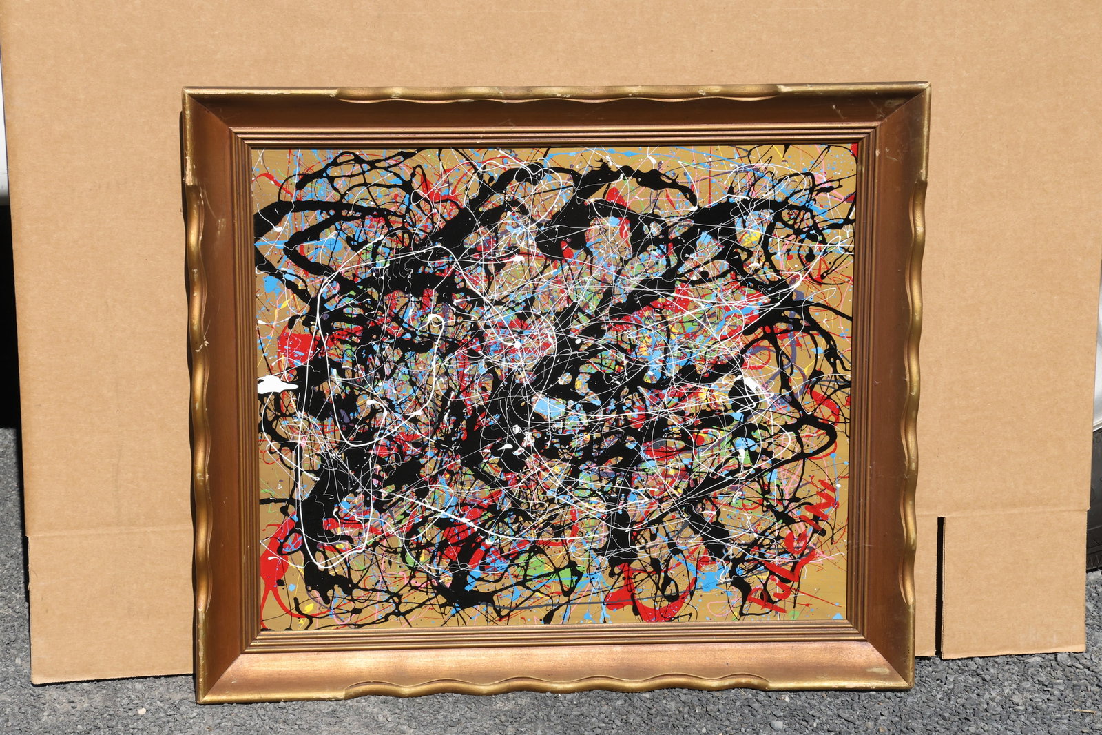 Thomas Pulgini Multicolor Drip Abstract on Tan Painting: Painting by Thomas Pulgini. A layered network of black, white, red, blue, and green drips crosses a tan ground. Fine looping trails intersect with thicker marks throughout the horizontal composition. 